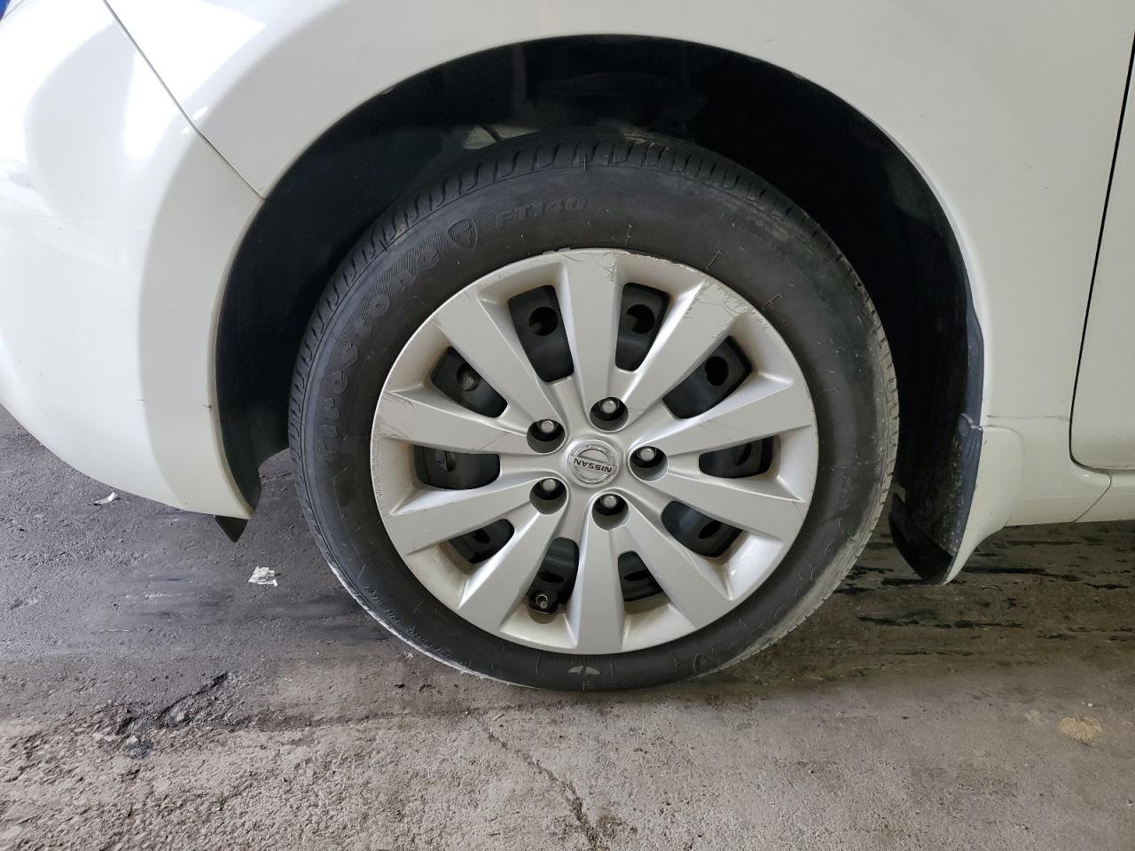 2013 Nissan Leaf S White vin: 1N4AZ0CP4DC413634 Damage: Left Front Wheel Cover, Broken, Replacement Required