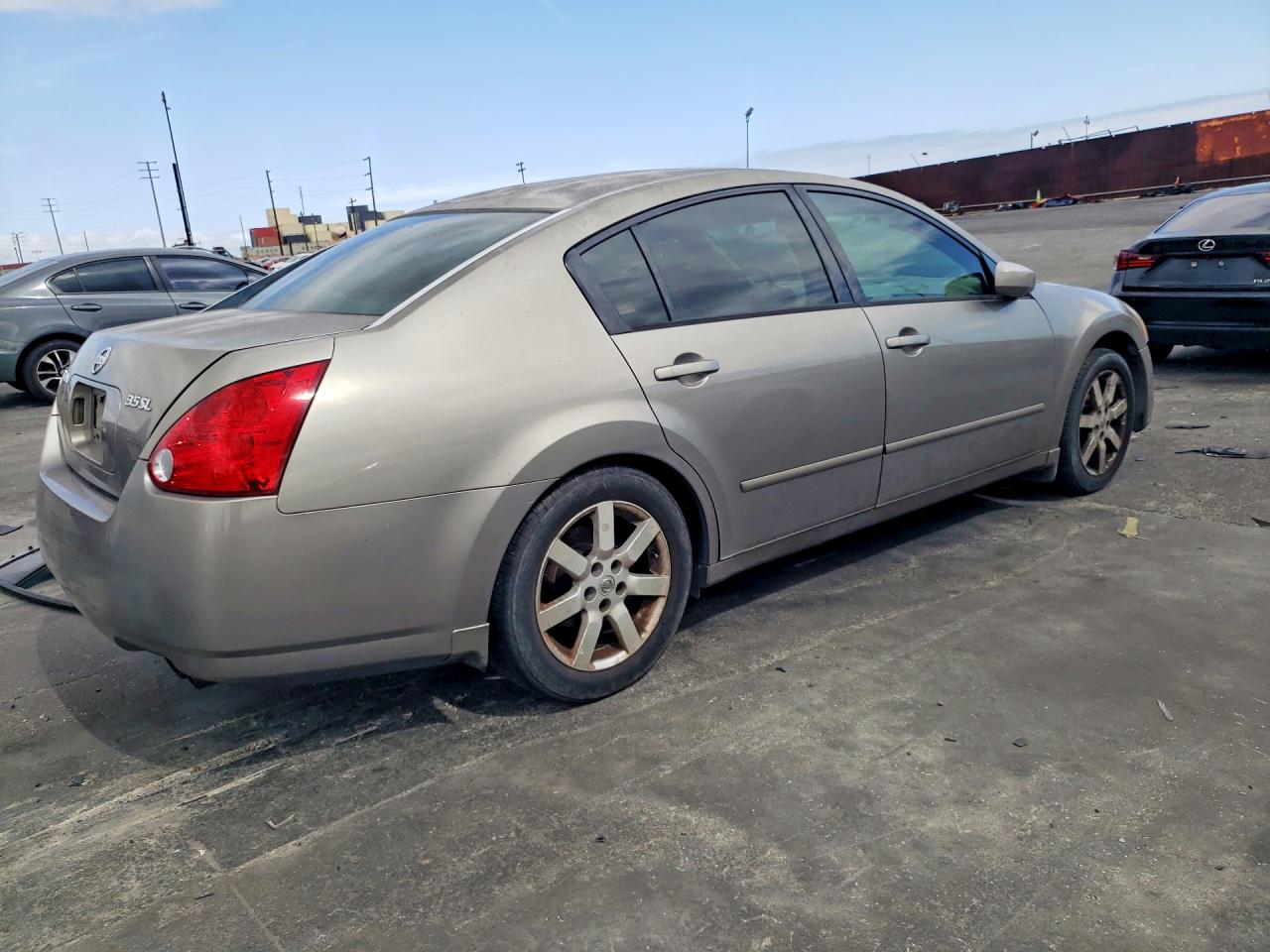 2005 Nissan Maxima 3.5 Se Gold vin: 1N4BA41EX5C850155