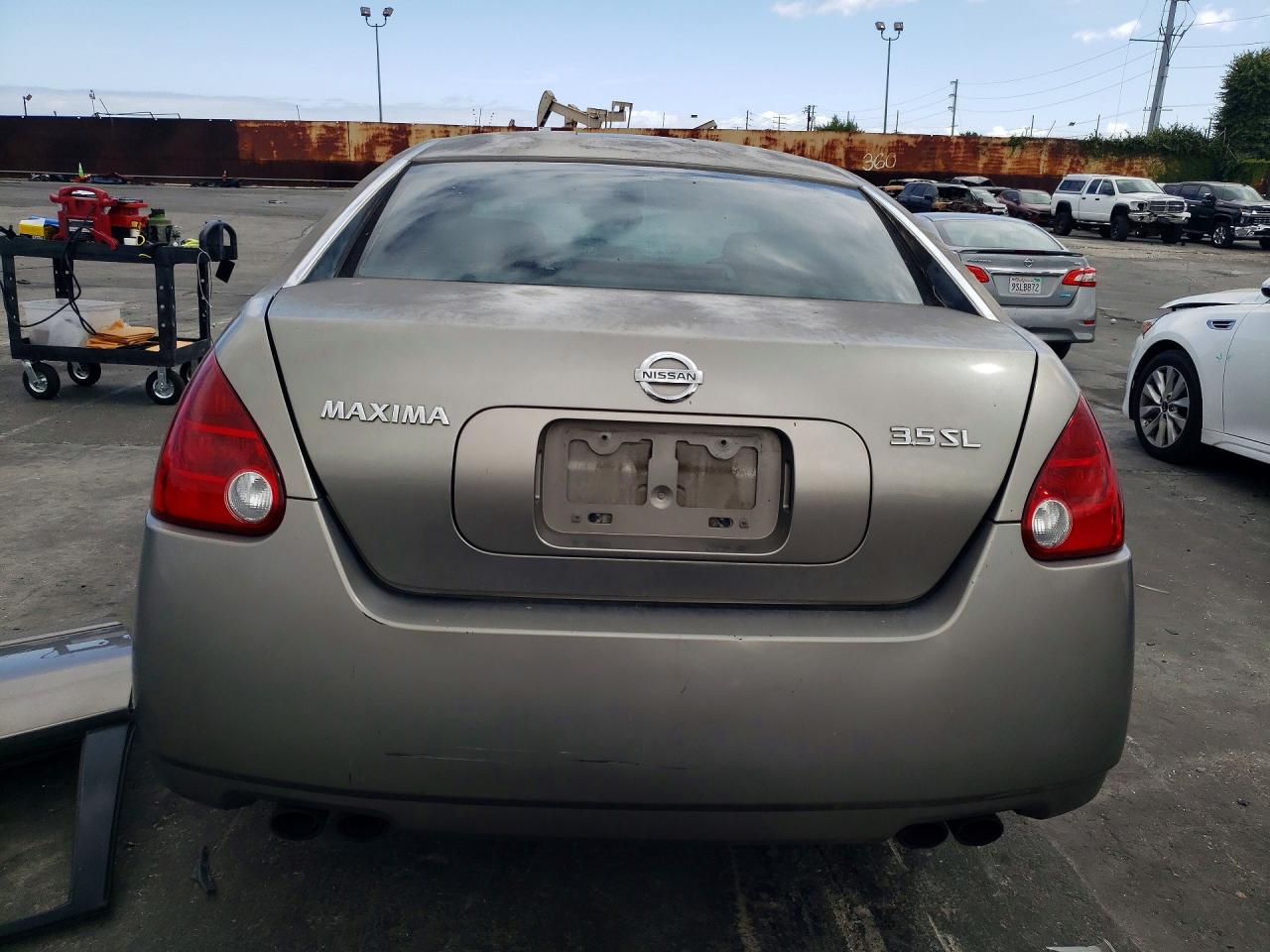 2005 Nissan Maxima 3.5 Se Gold vin: 1N4BA41EX5C850155