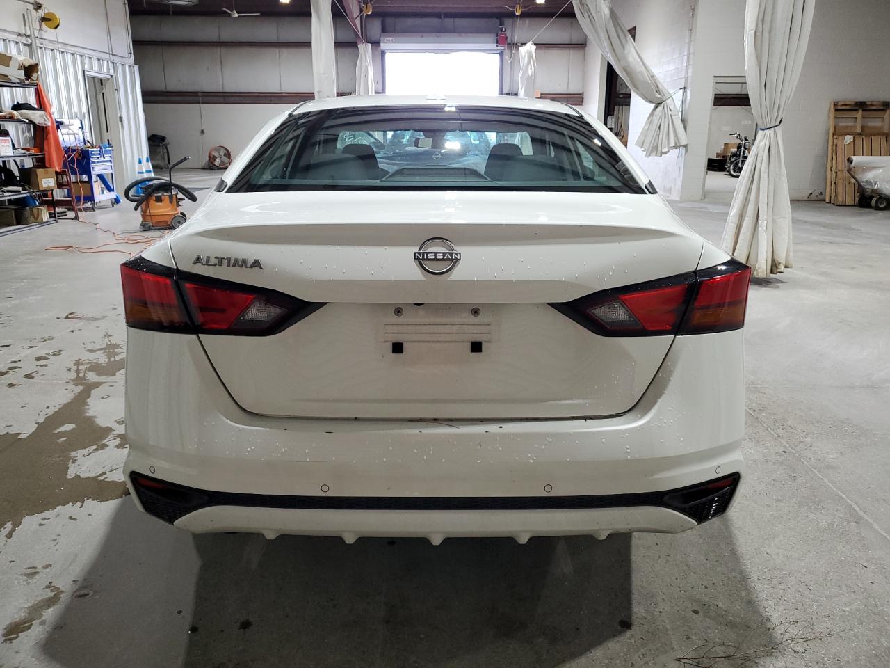 2025 Nissan Altima Sv White vin: 1N4BL4DV9SN304792 Damage: Rear Bumper, Multiple Scratches Heavy, 2