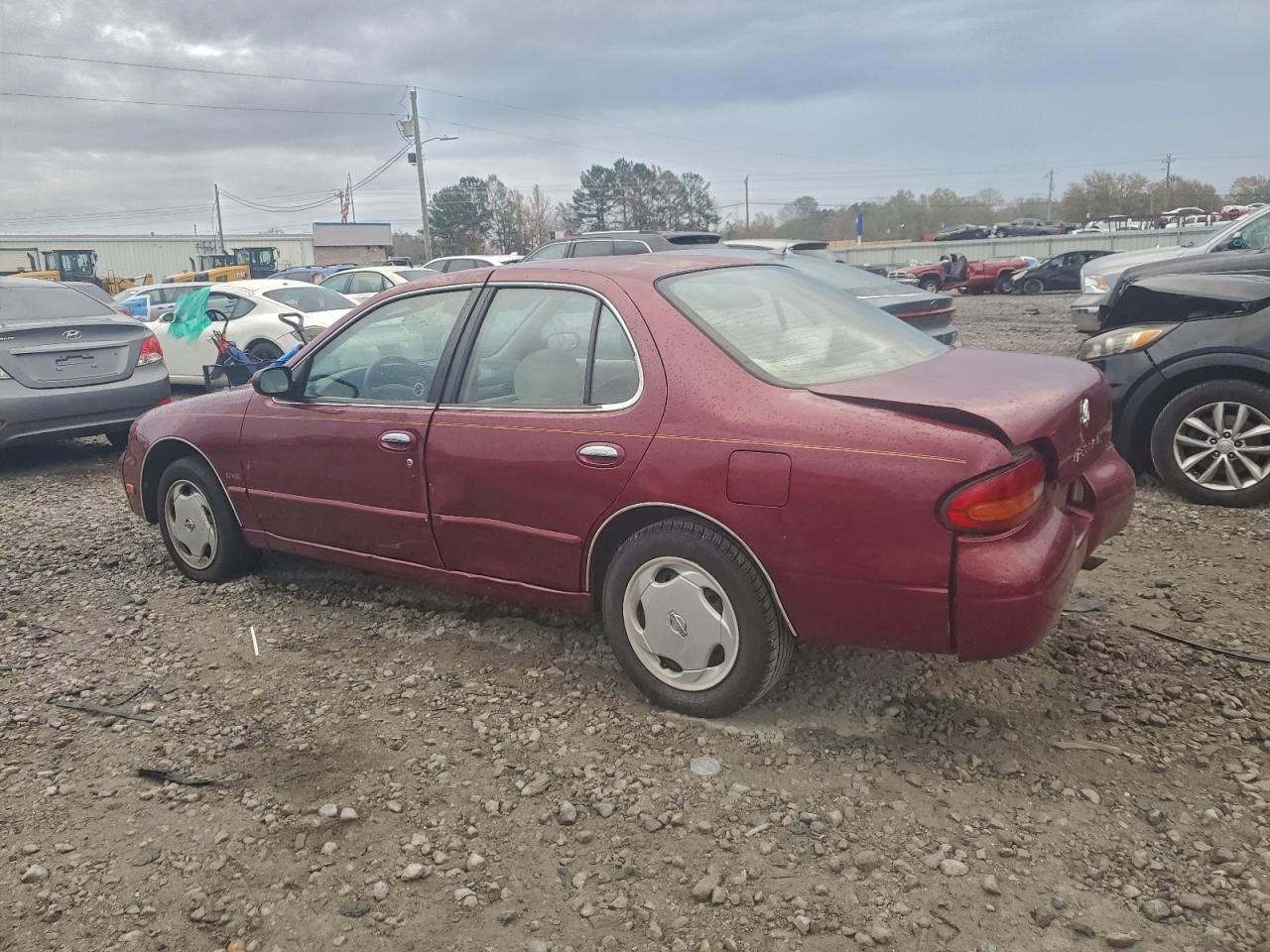 1994 Nissan Altima Xe Burgundy vin: 1N4BU31D7RC220091