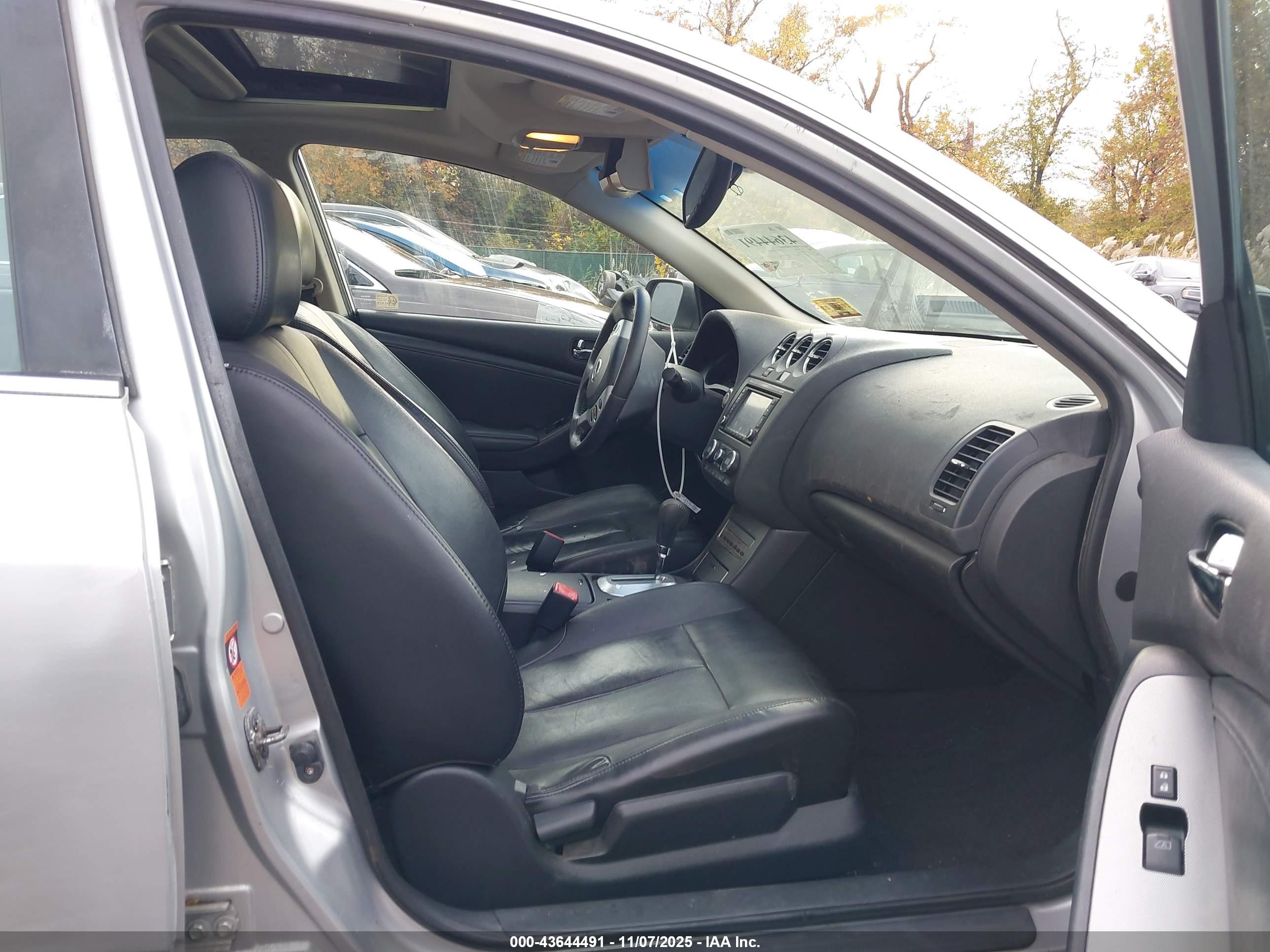 2008 Nissan Altima Hybrid   Silver vin: 1N4CL21E78C200075
