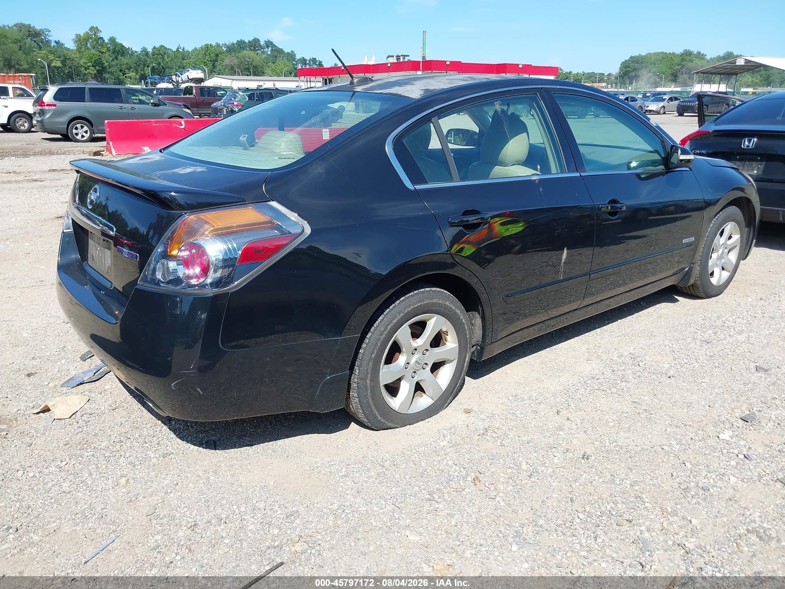 2009 Nissan Altima Hybrid   Black vin: 1N4CL21E99C121248