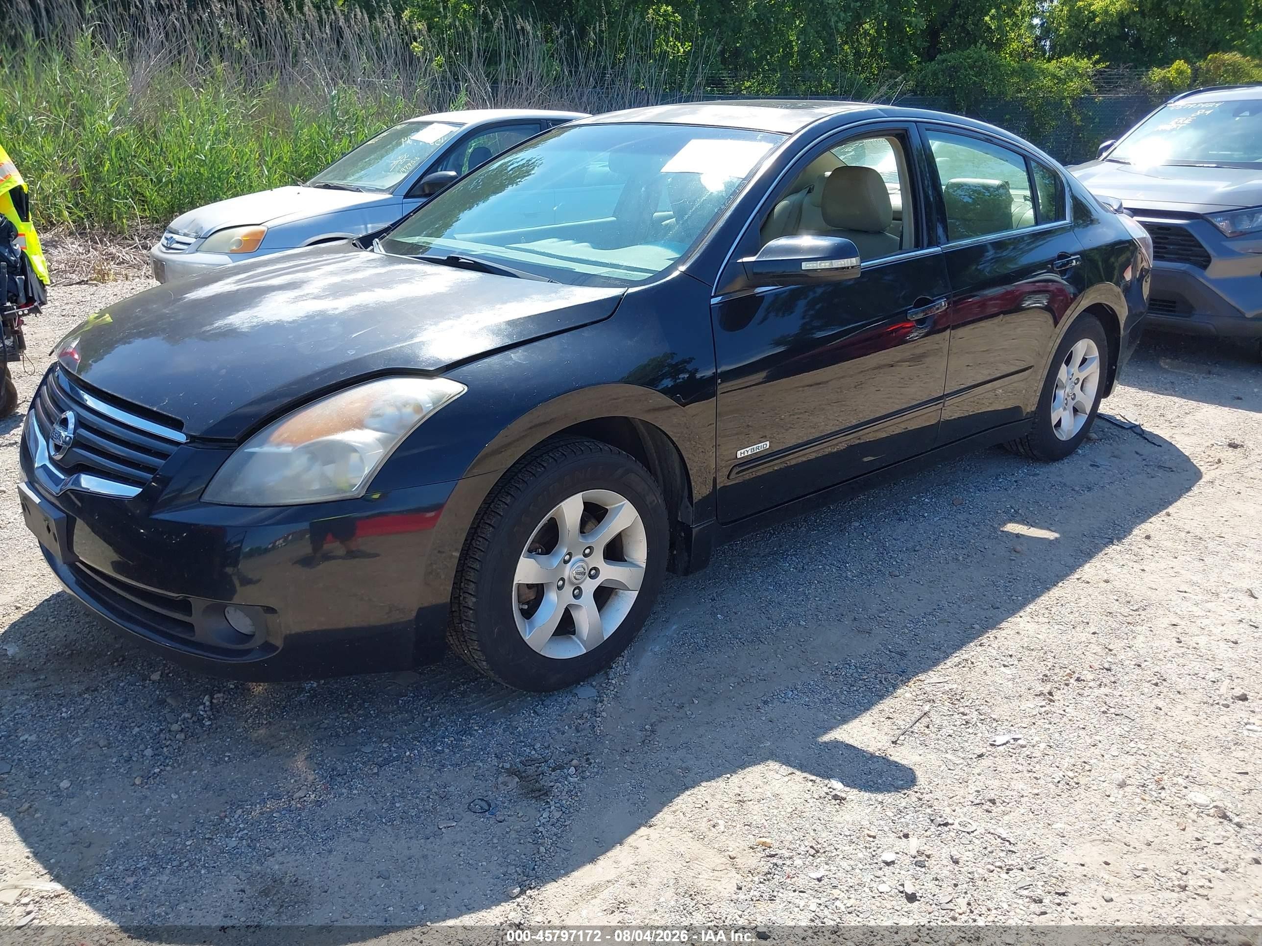 2009 Nissan Altima Hybrid   Black vin: 1N4CL21E99C121248