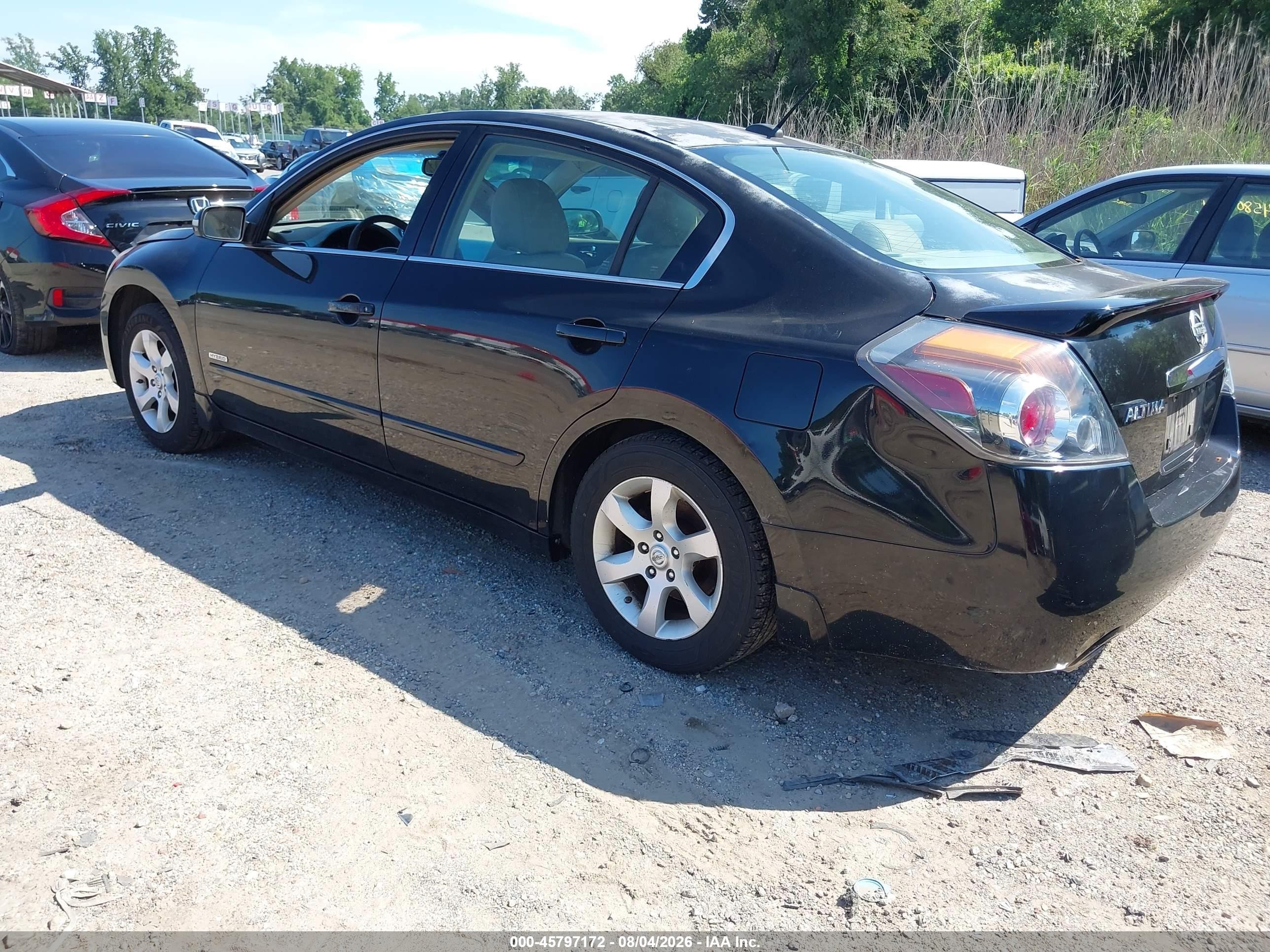 2009 Nissan Altima Hybrid   Black vin: 1N4CL21E99C121248