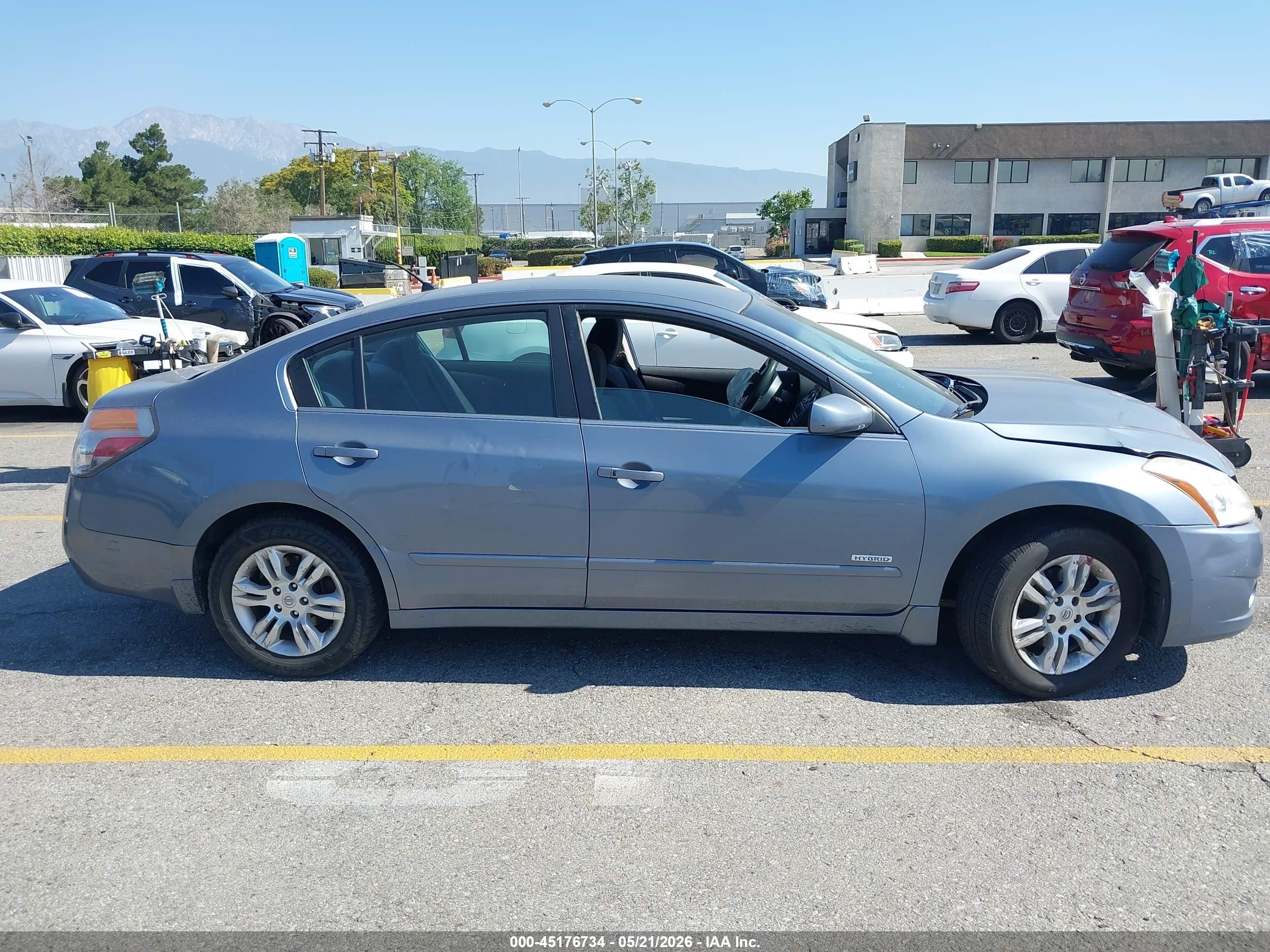 2010 Nissan Altima Hybrid   Blue vin: 1N4CL2AP2AC135417