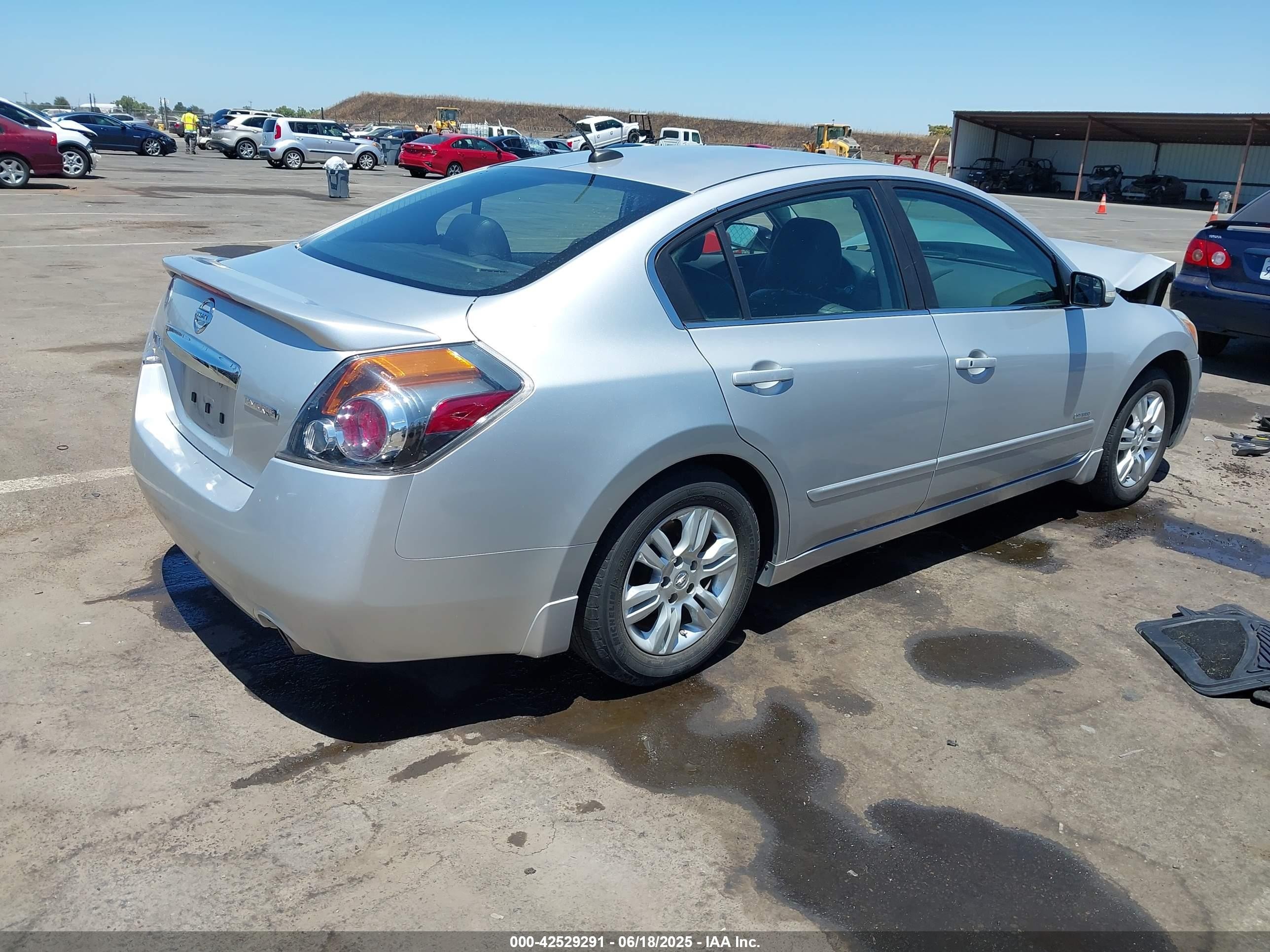 2011 Nissan Altima Hybrid   Silver vin: 1N4CL2AP8BC111060