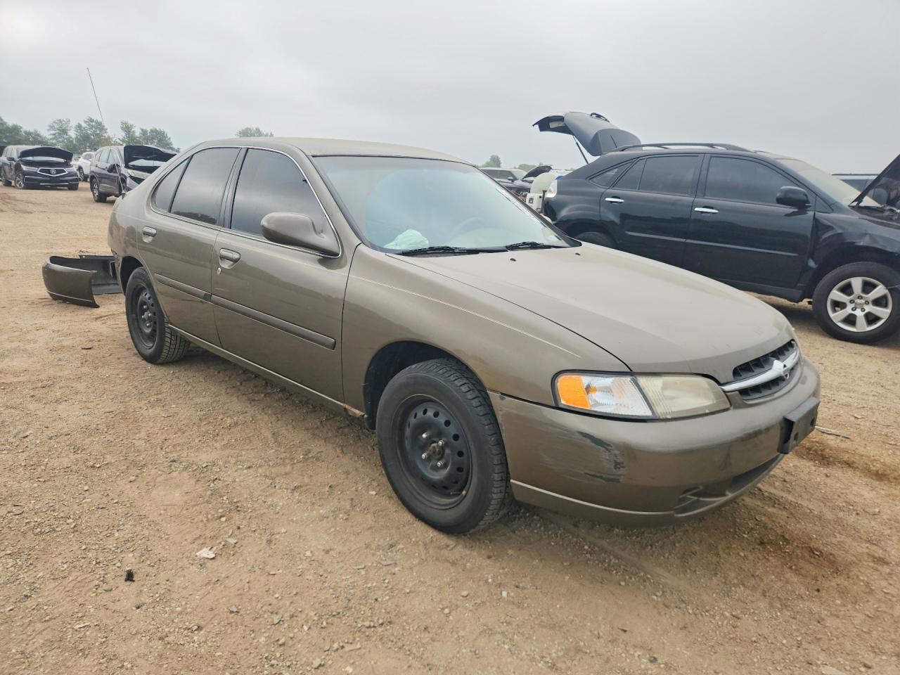 1999 Nissan Altima Xe Tan vin: 1N4DL01D5XC124340