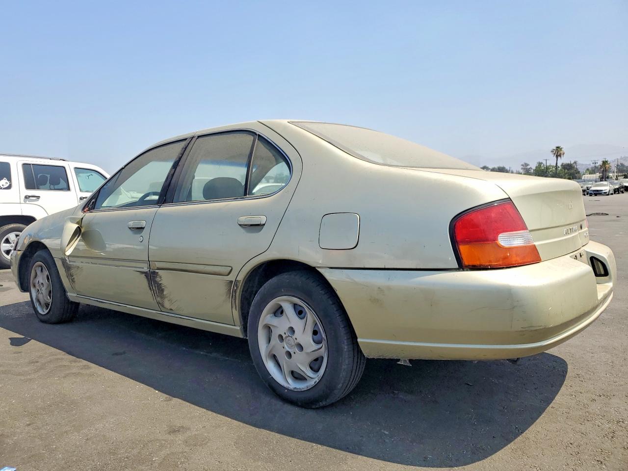 1999 Nissan Altima Xe Tan vin: 1N4DL01D9XC207270