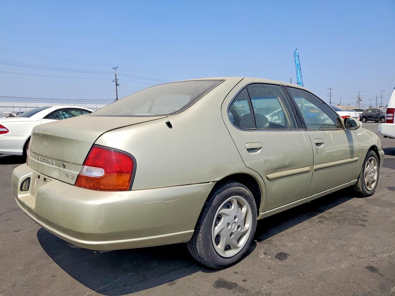 1999 Nissan Altima Xe Tan vin: 1N4DL01D9XC207270
