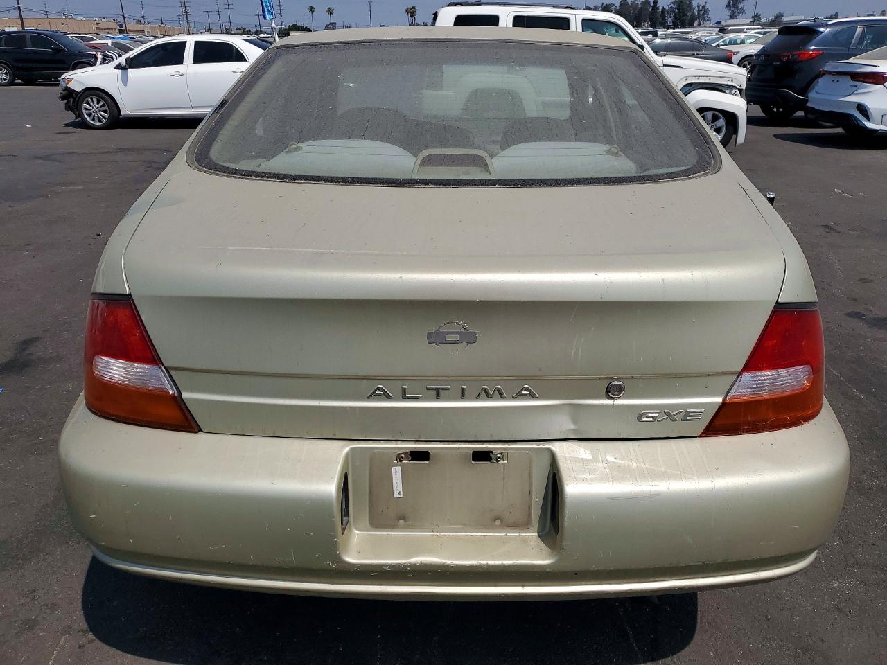 1999 Nissan Altima Xe Tan vin: 1N4DL01D9XC207270
