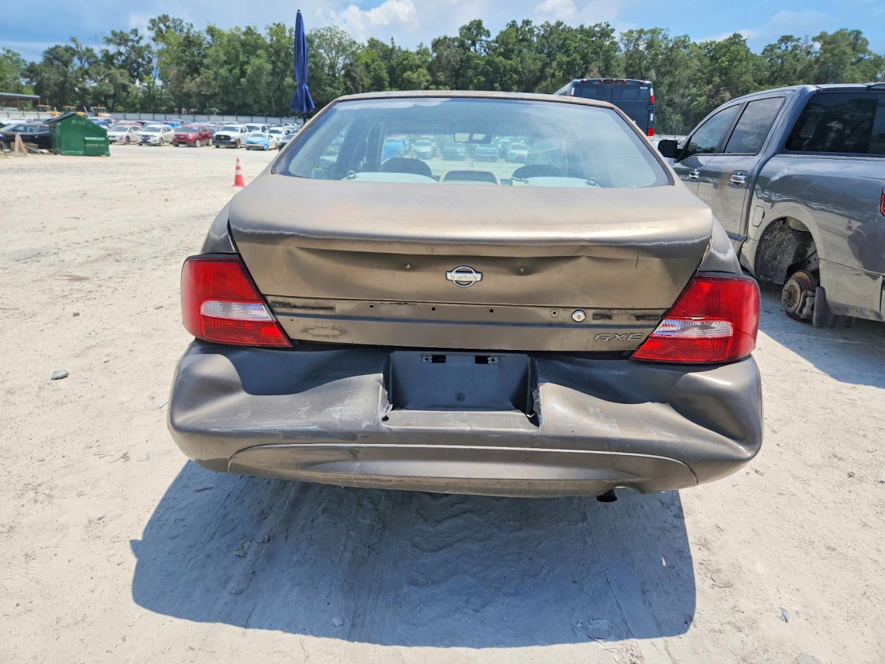 2001 Nissan Altima Xe Tan vin: 1N4DL01DX1C131467