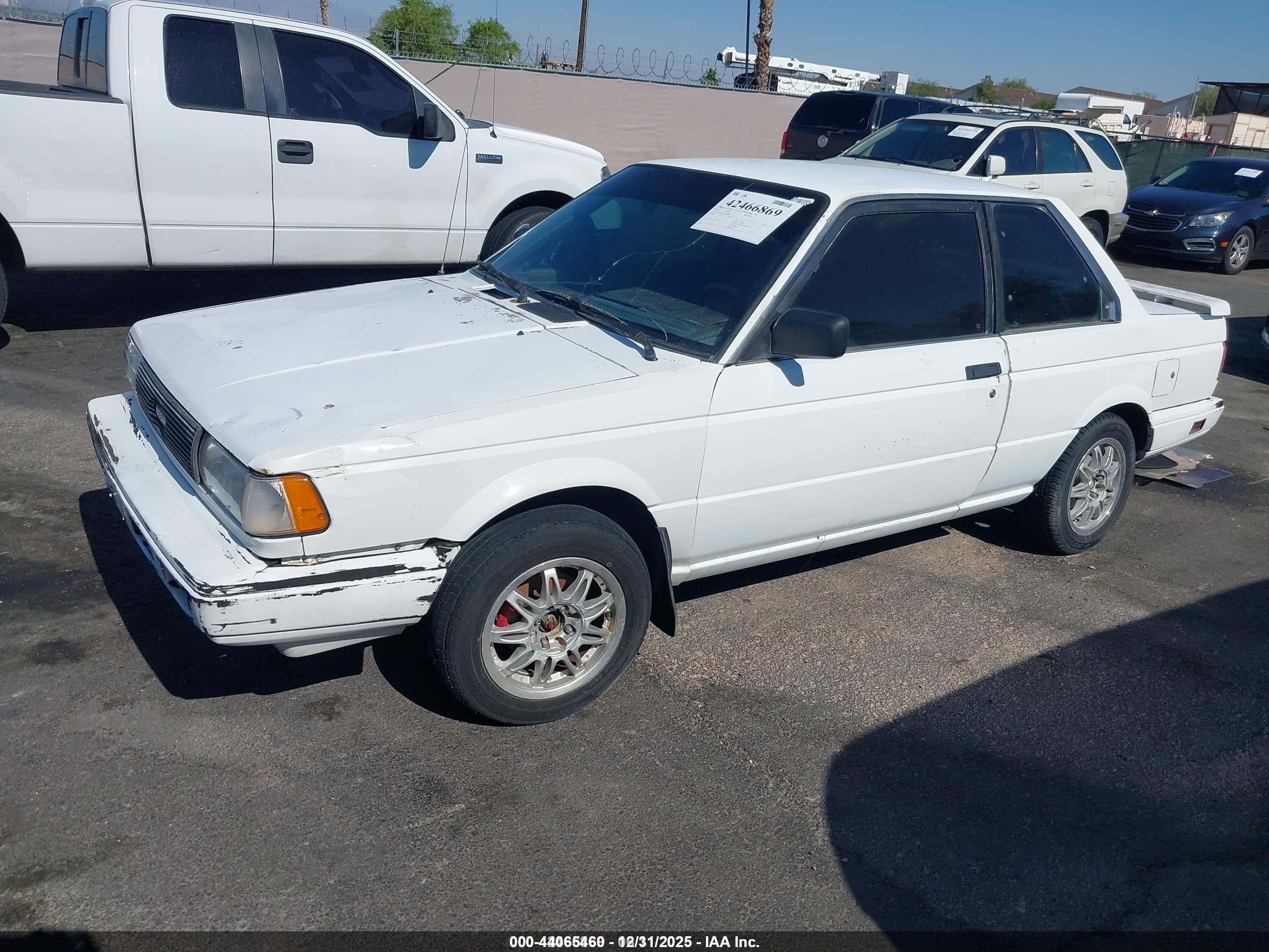 1990 Nissan Sentra   White vin: 1N4GB22B7LC791588