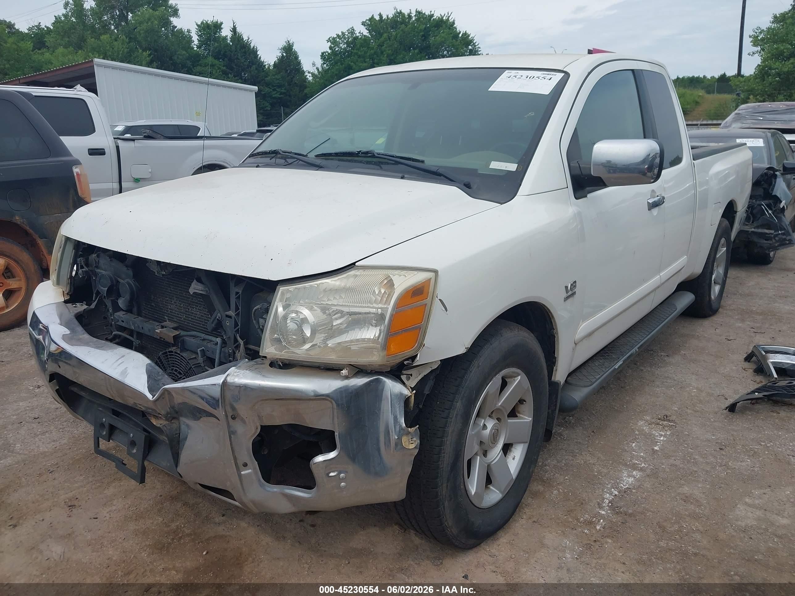 2004 Nissan Titan Le Белый vin: 1N6AA06A44N580487