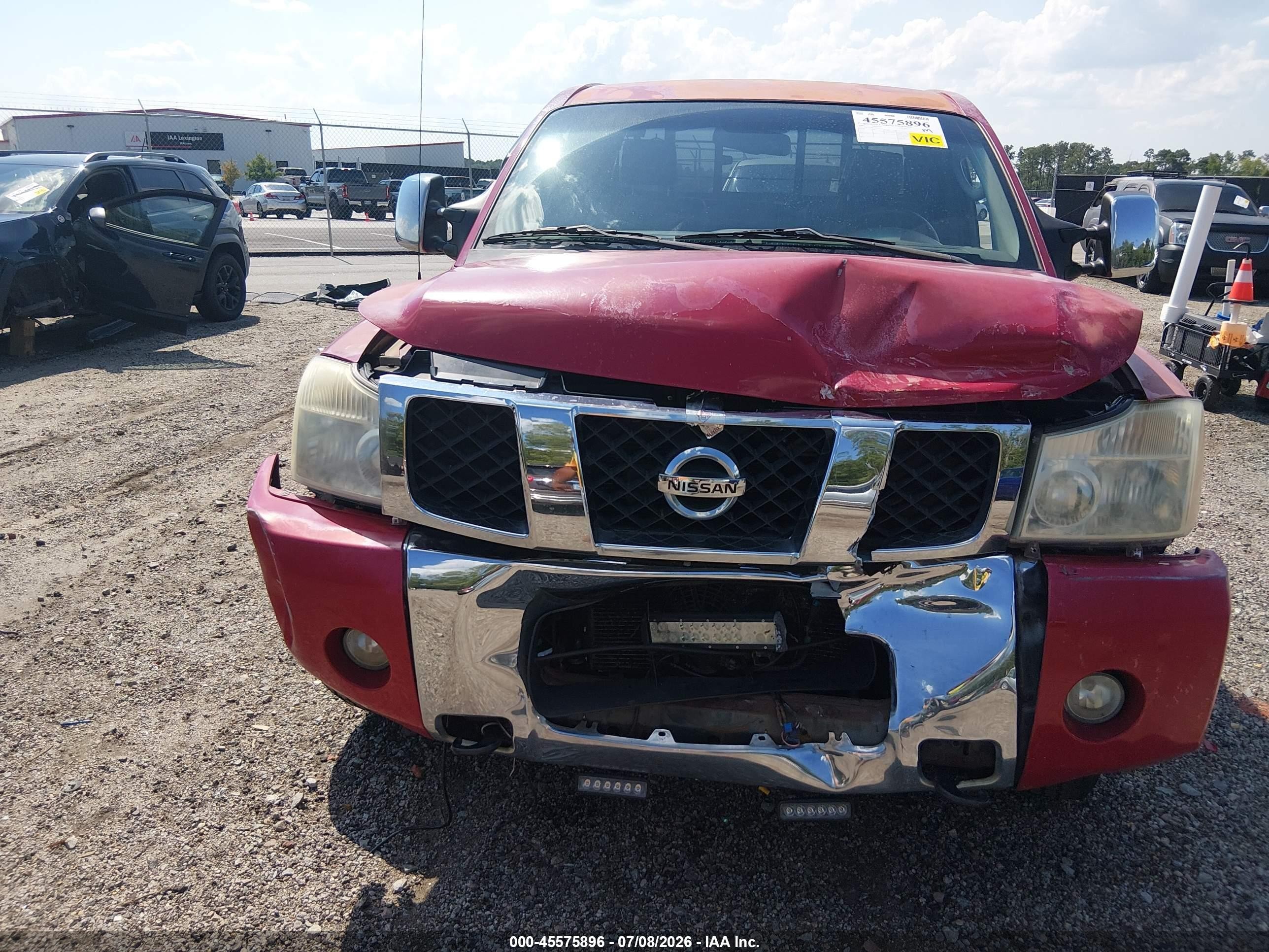 2007 Nissan Titan Le Red vin: 1N6AA06B17N233941