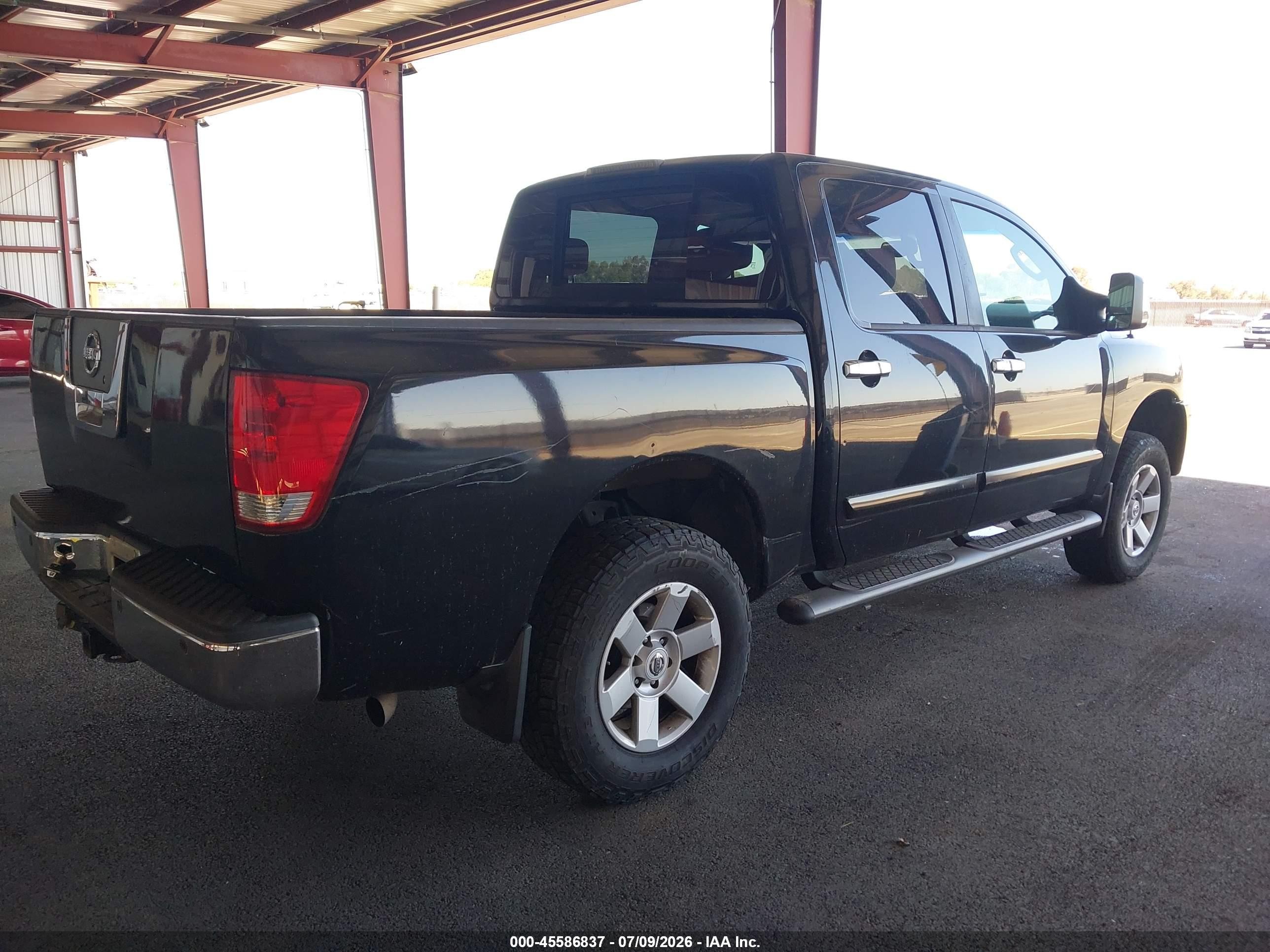 2005 Nissan Titan Le Black vin: 1N6AA07A25N551358