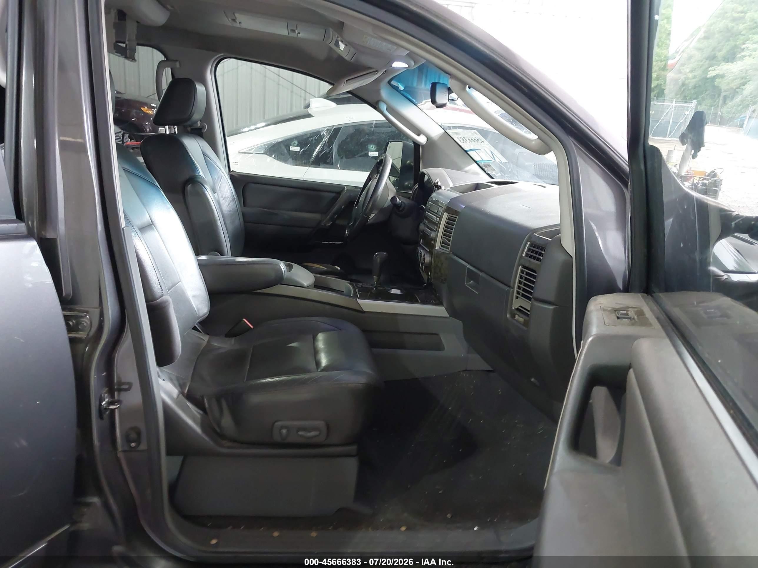 2006 Nissan Titan Le Blue vin: 1N6AA07A76N504215