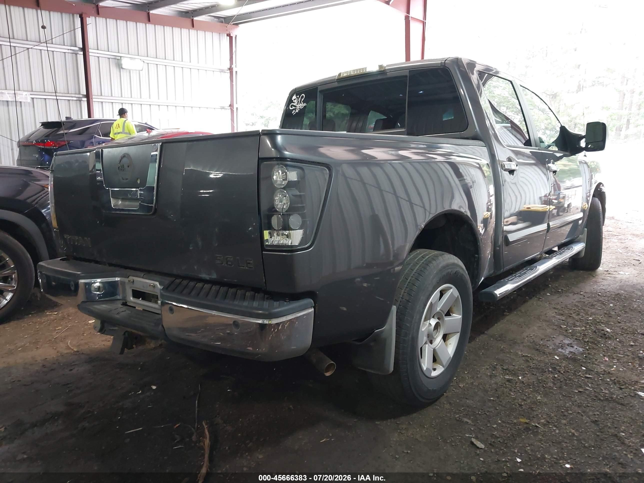 2006 Nissan Titan Le Blue vin: 1N6AA07A76N504215
