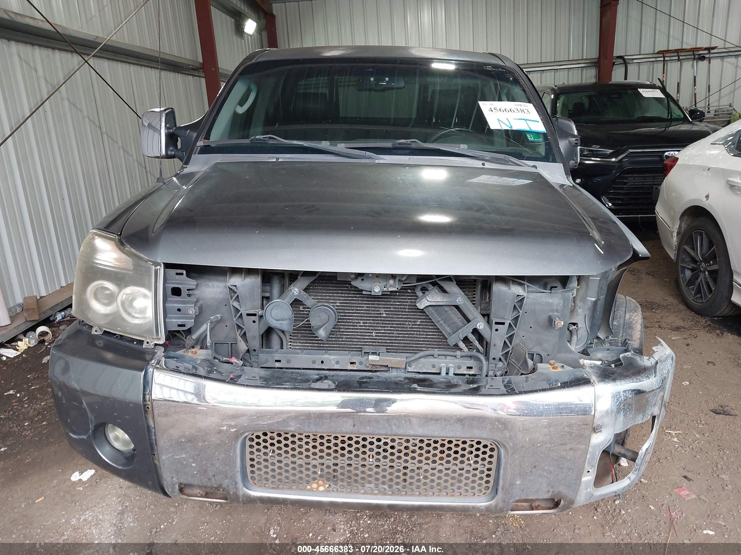 2006 Nissan Titan Le Blue vin: 1N6AA07A76N504215