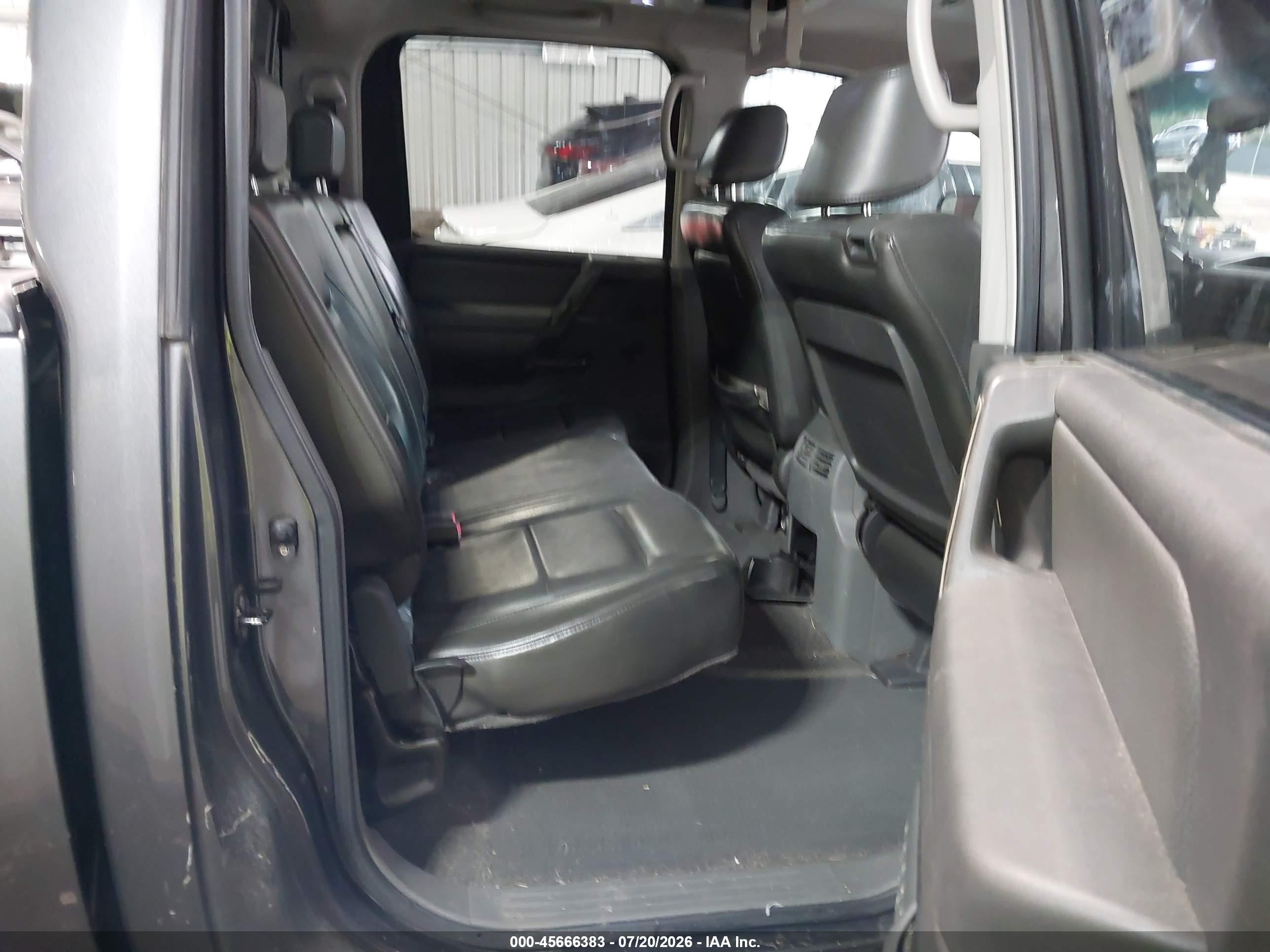 2006 Nissan Titan Le Blue vin: 1N6AA07A76N504215
