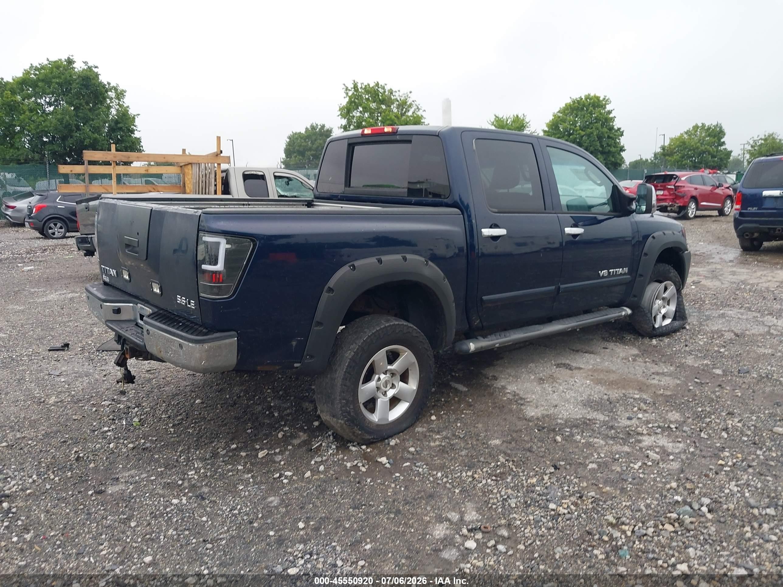 2007 Nissan Titan Le Blue vin: 1N6AA07B37N207016