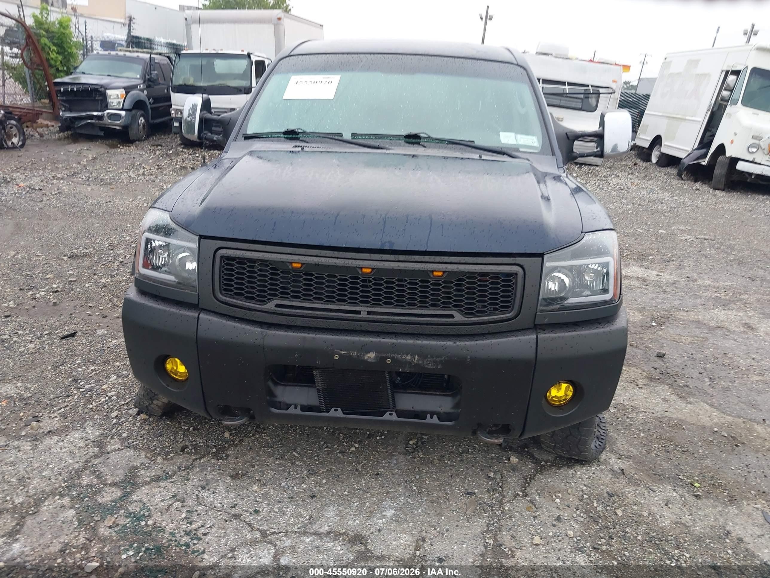 2007 Nissan Titan Le Blue vin: 1N6AA07B37N207016