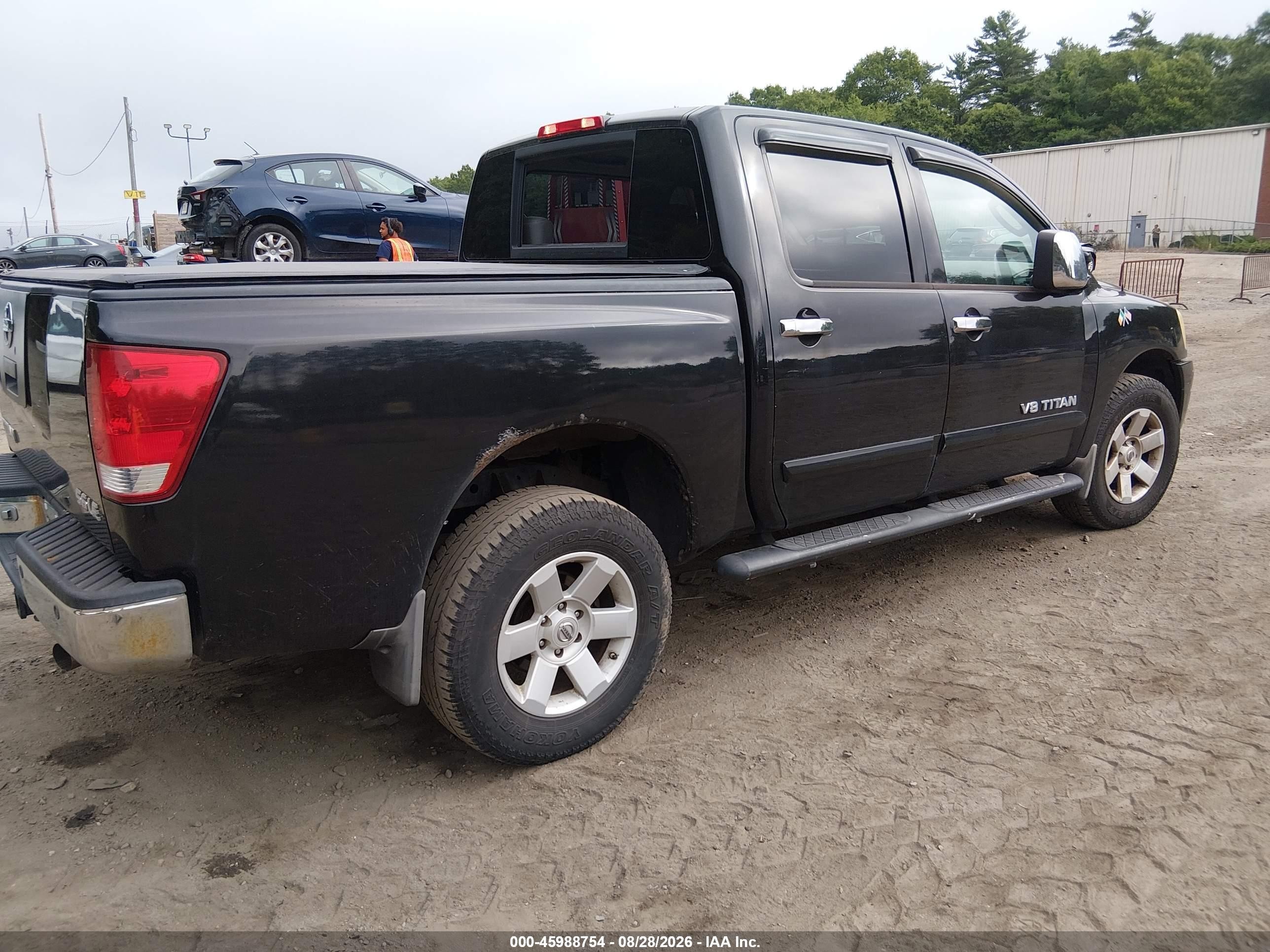 2006 Nissan Titan Le Black vin: 1N6AA07BX6N540733