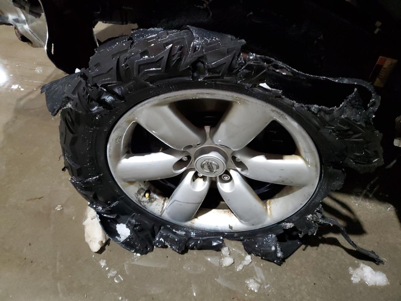 2009 Nissan Titan Xe Silver vin: 1N6AA07C79N319278 Damage: Left Front Tire, Cut, Replacement Required
