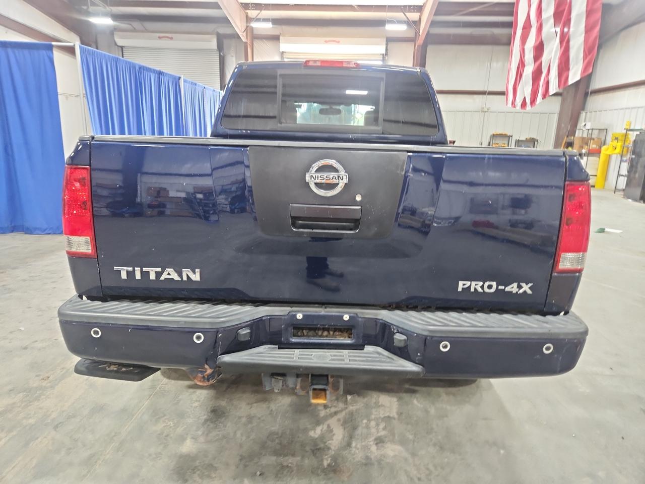 2012 Nissan Titan Sv Blue vin: 1N6AA0EC2CN323216 Damage: Tailgate, Heavy Scratch, 2 To 3 Inches