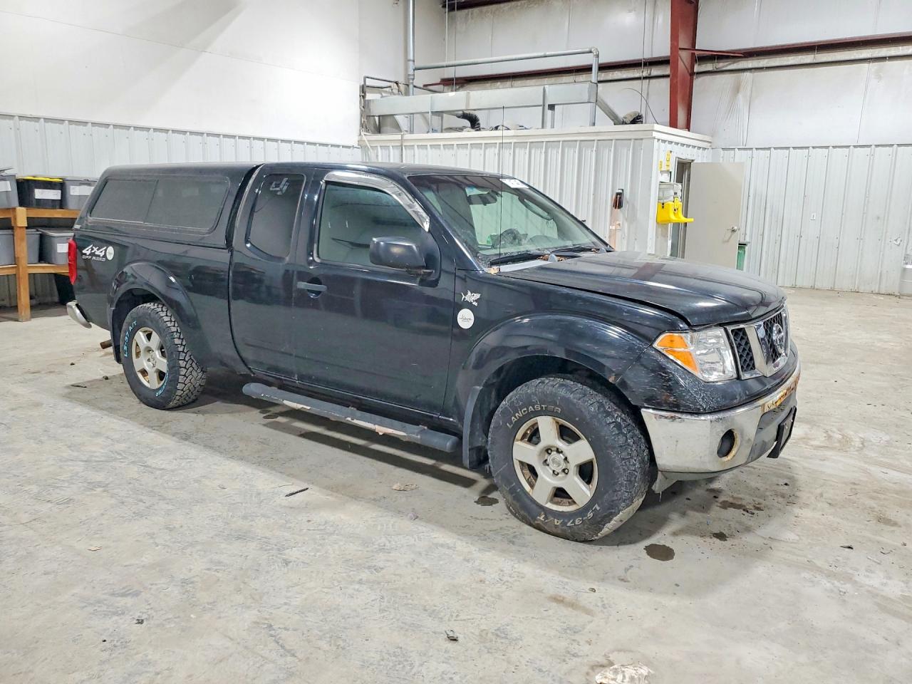 2006 Nissan Frontier King Cab Le Black vin: 1N6AD06W66C423190