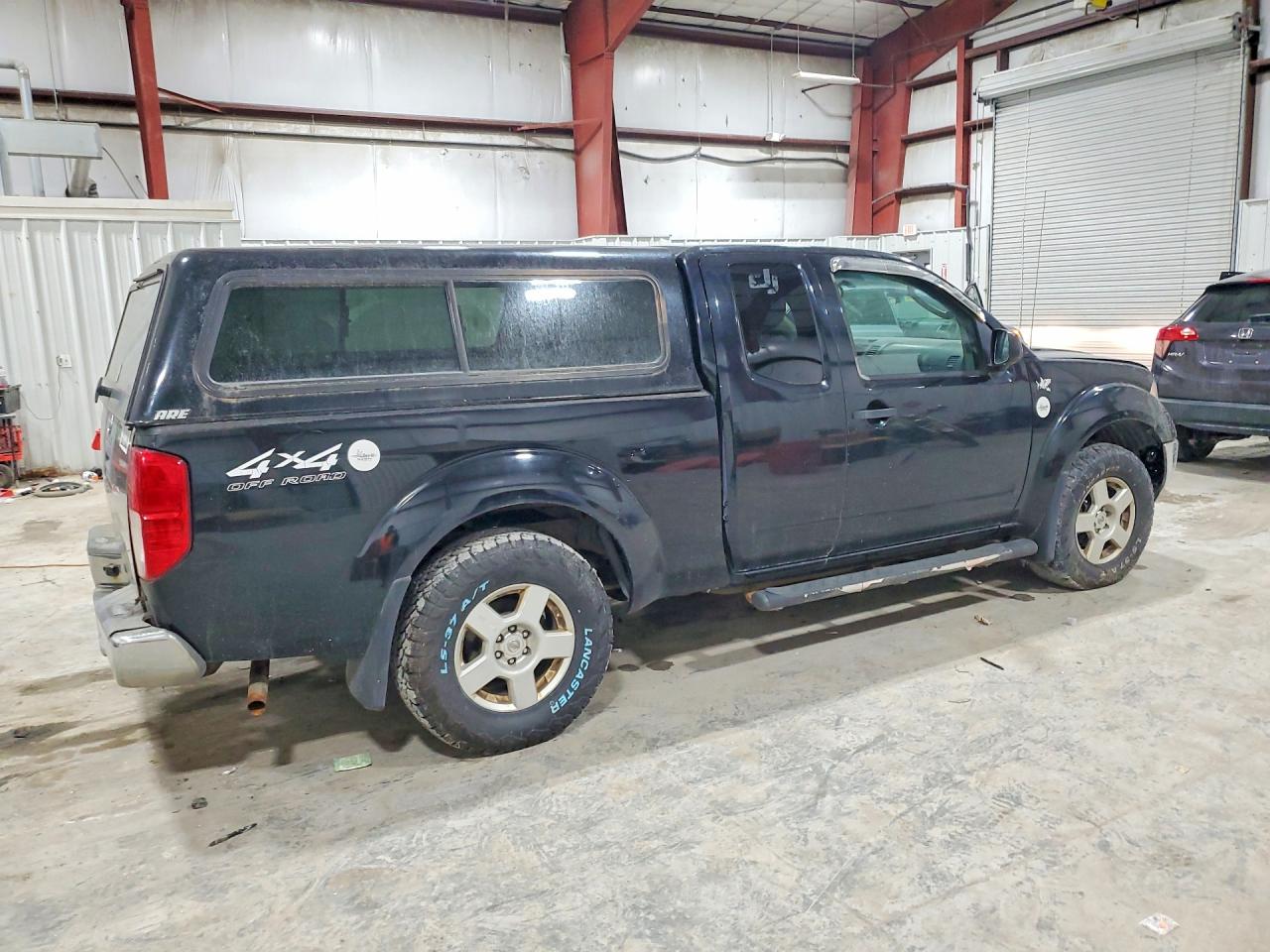2006 Nissan Frontier King Cab Le Black vin: 1N6AD06W66C423190