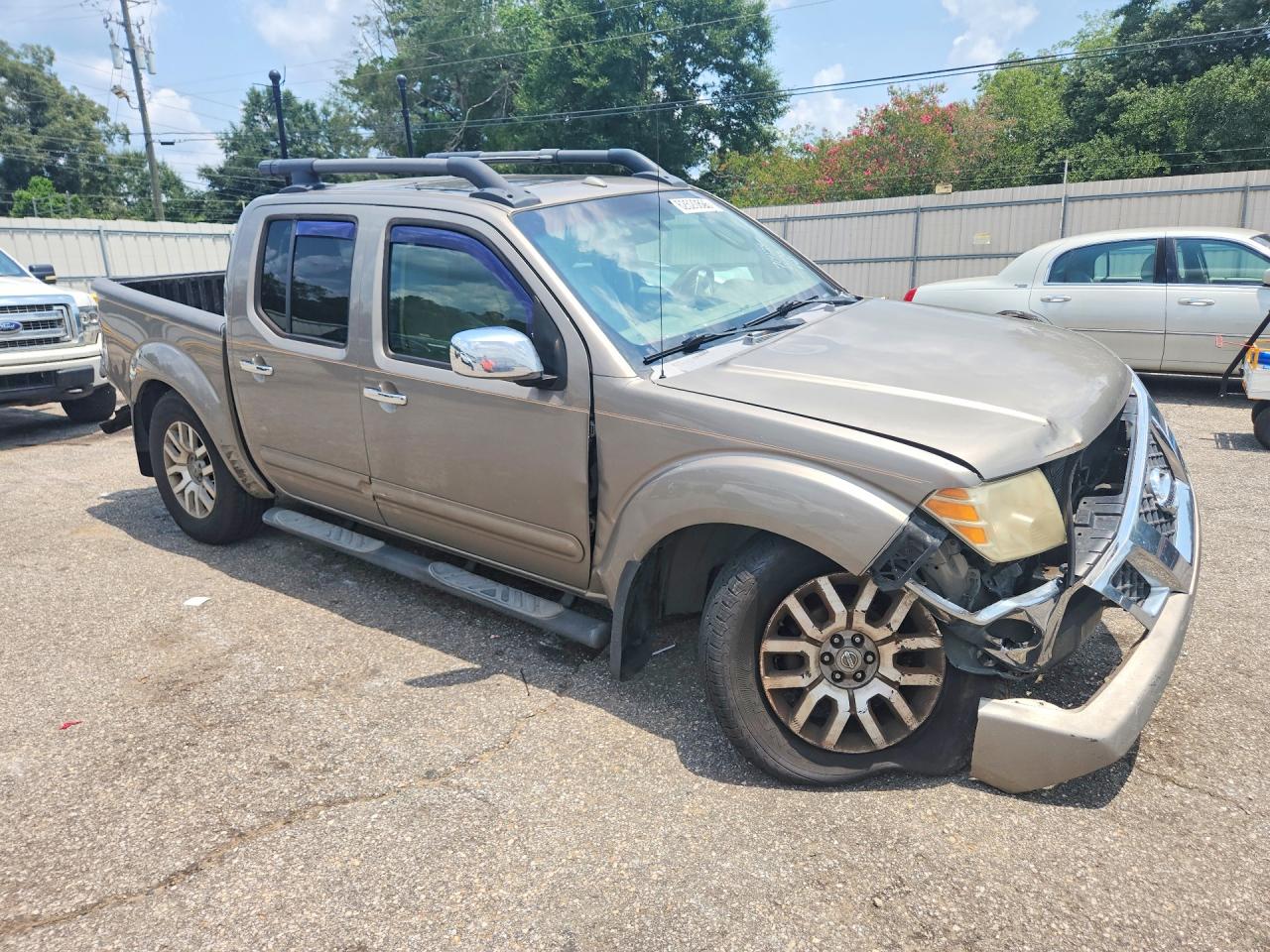 2009 Nissan Frontier Se V6 Tan vin: 1N6AD07U49C417132