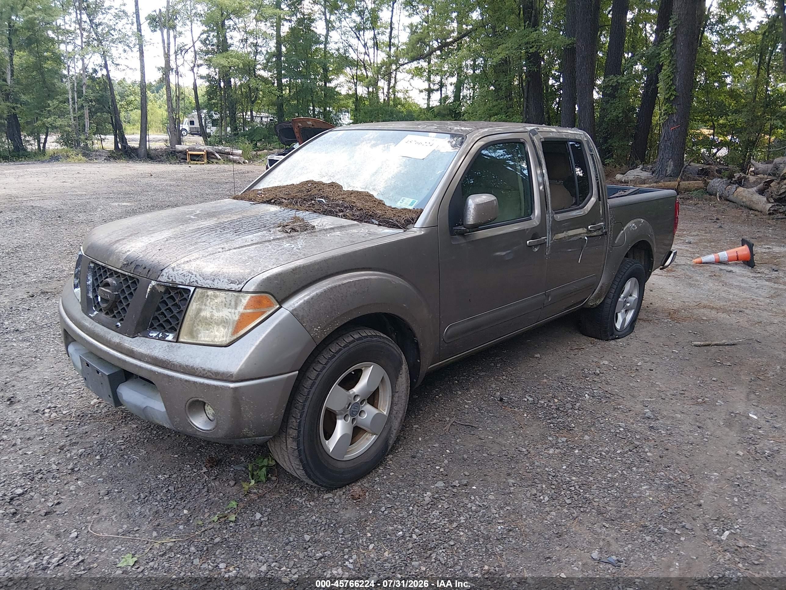 2005 Nissan Frontier Le Gold vin: 1N6AD07U75C408788