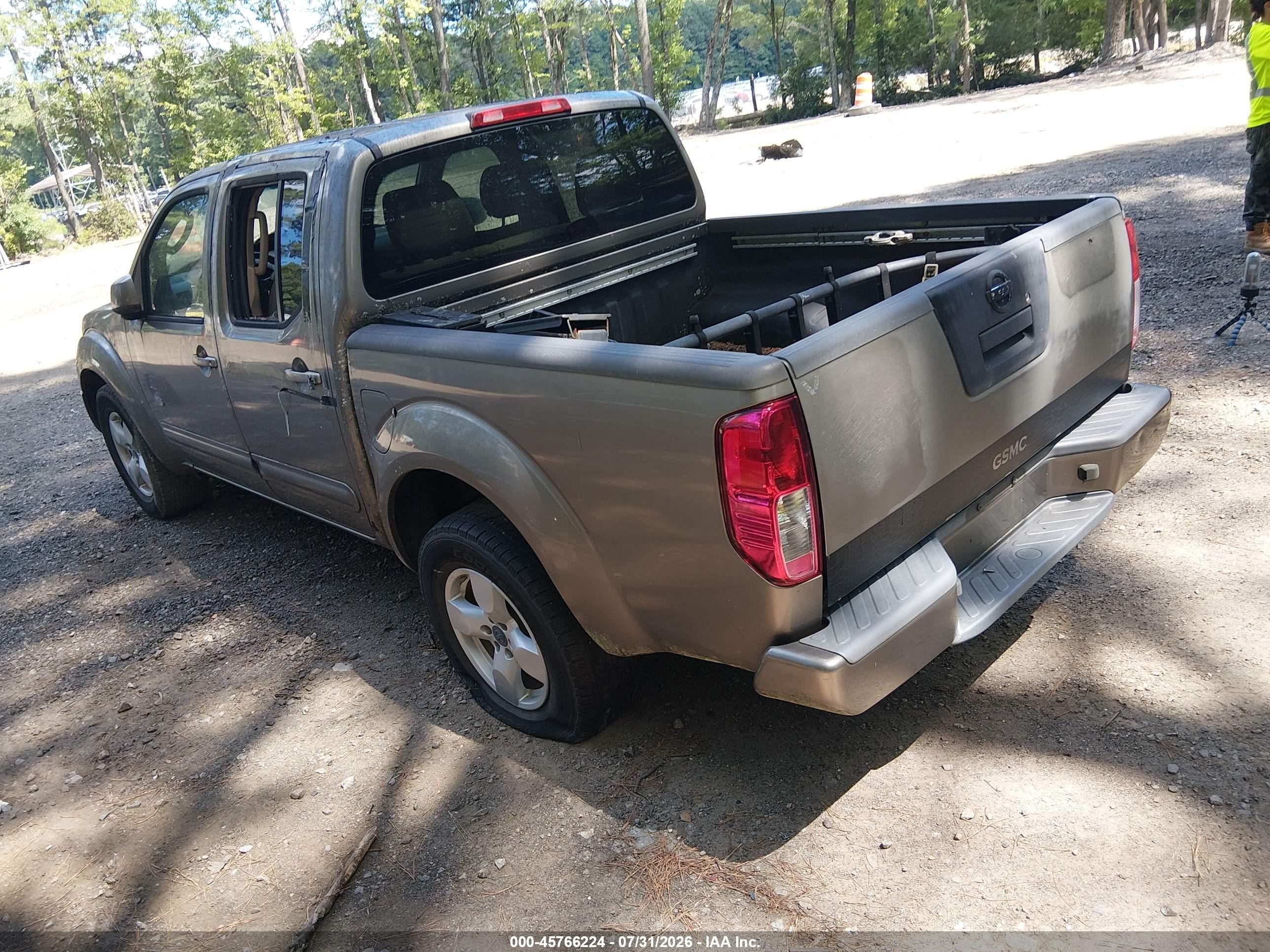 2005 Nissan Frontier Le Gold vin: 1N6AD07U75C408788