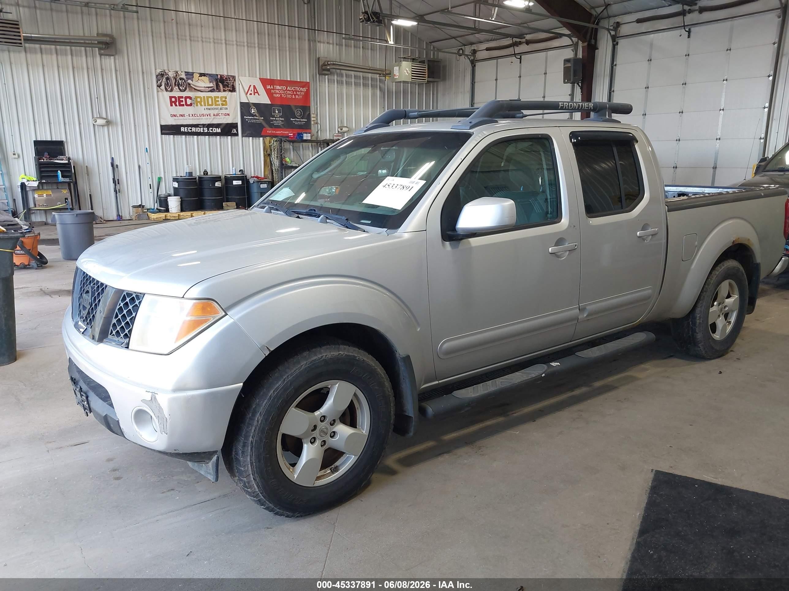 2007 Nissan Frontier Le Серебряный vin: 1N6AD09W77C405892