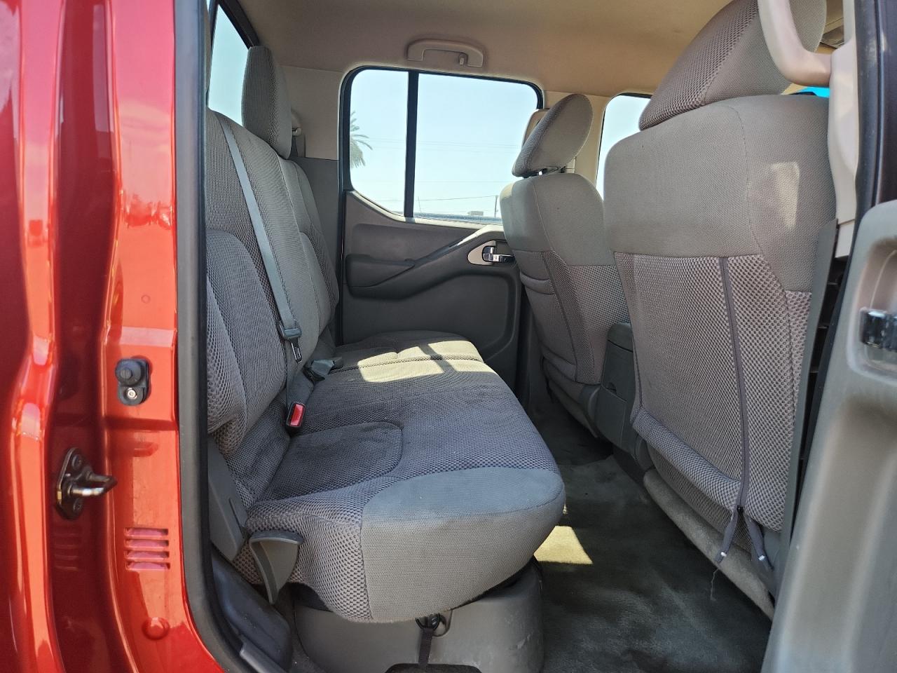 2015 Nissan Frontier Sv Red vin: 1N6AD0ER8FN722468 Damage: Right Rear Seat Cushion, Stained, Permanent