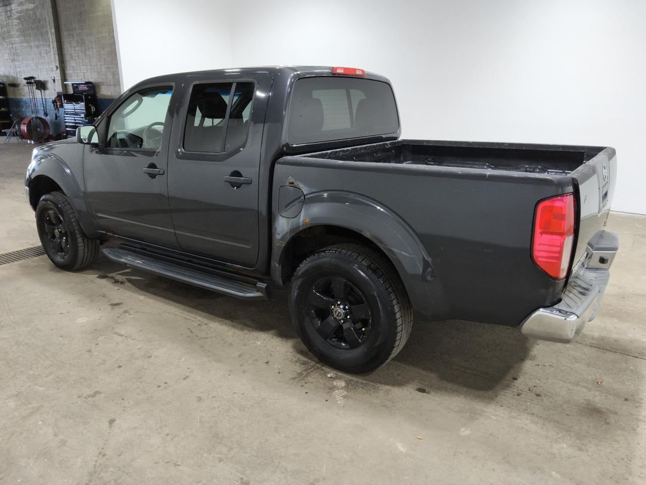 2011 Nissan Frontier S Charcoal vin: 1N6AD0EV9BC403843 Damage: Left Rocker Panel, Rust, > 12 Inches