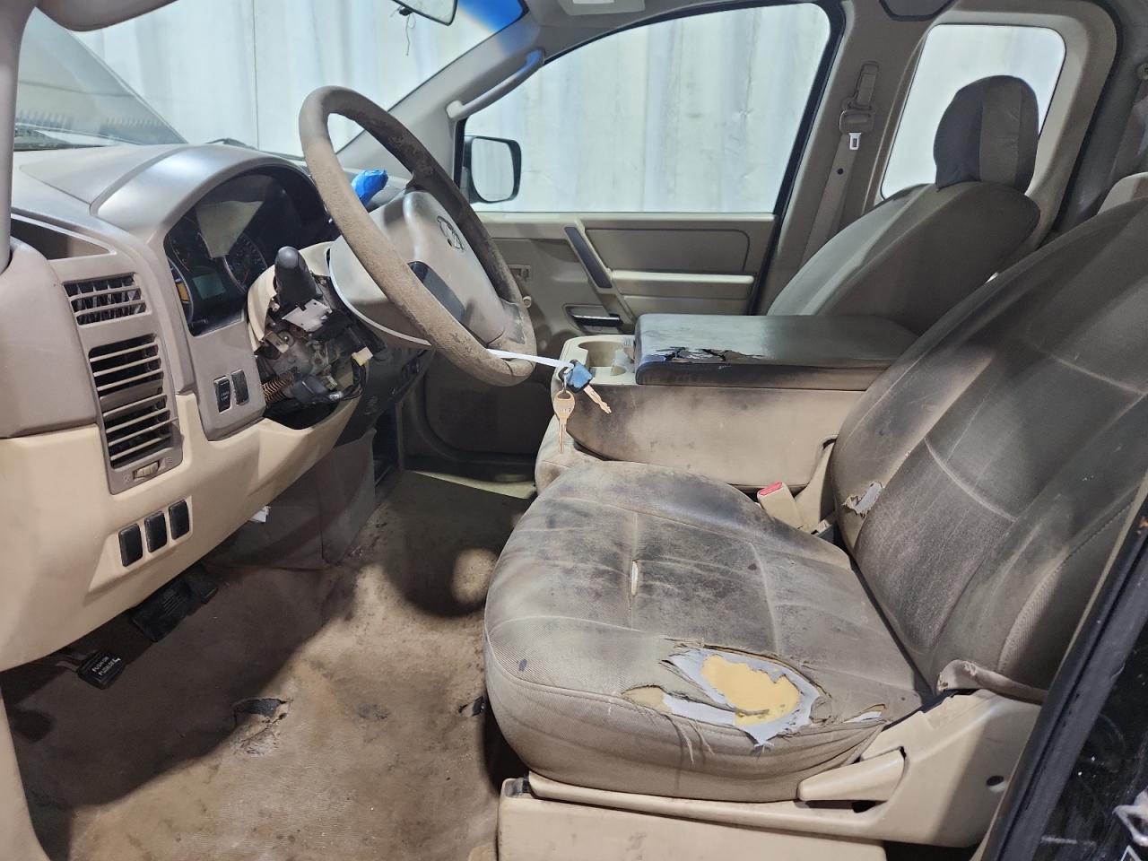 2008 Nissan Titan Xe Ffv Black vin: 1N6BA06A78N360660 Damage: Left Front Seat, Torn, > 12 Inches