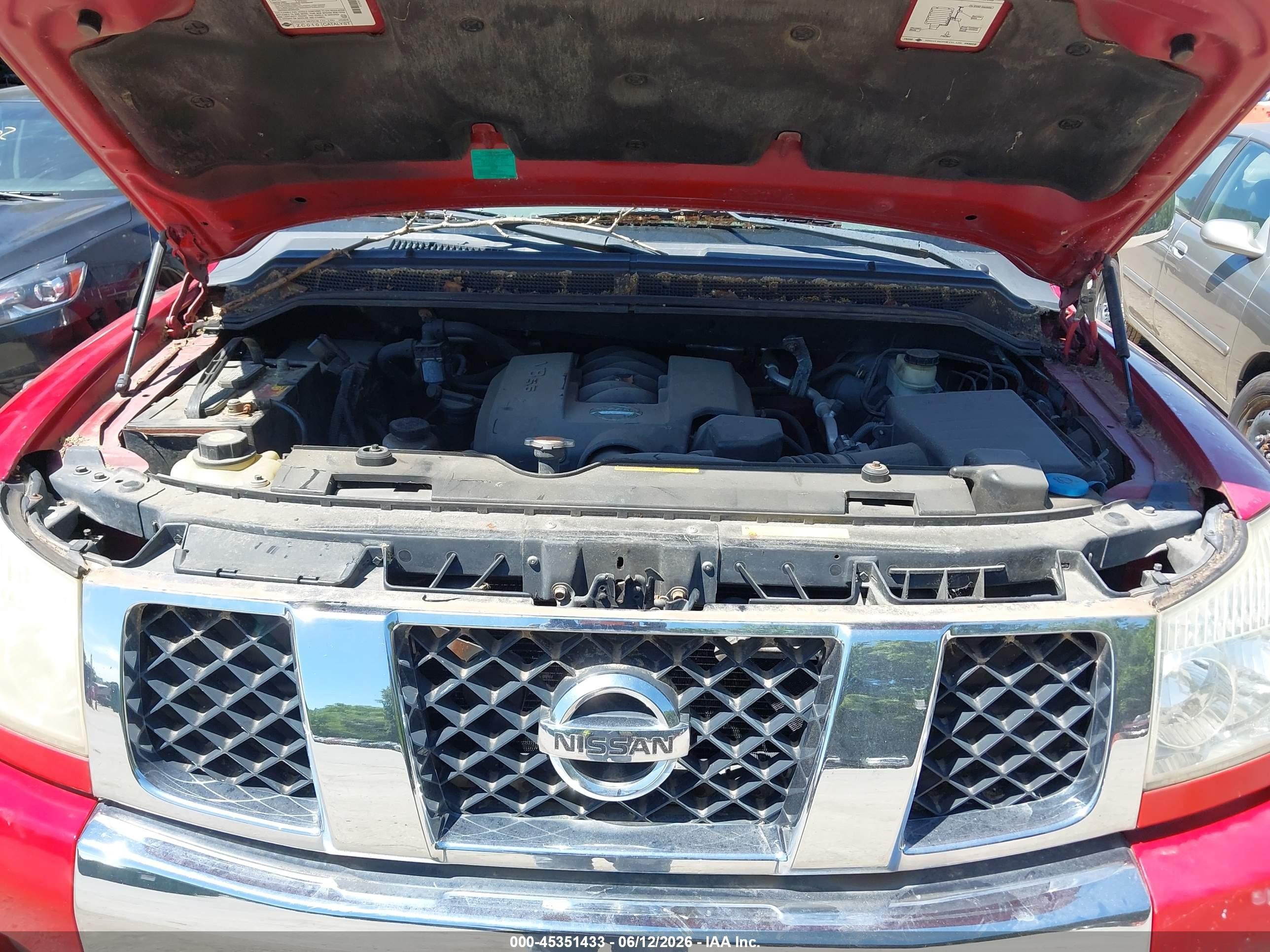 2005 Nissan Titan Le Red vin: 1N6BA06B15N550894
