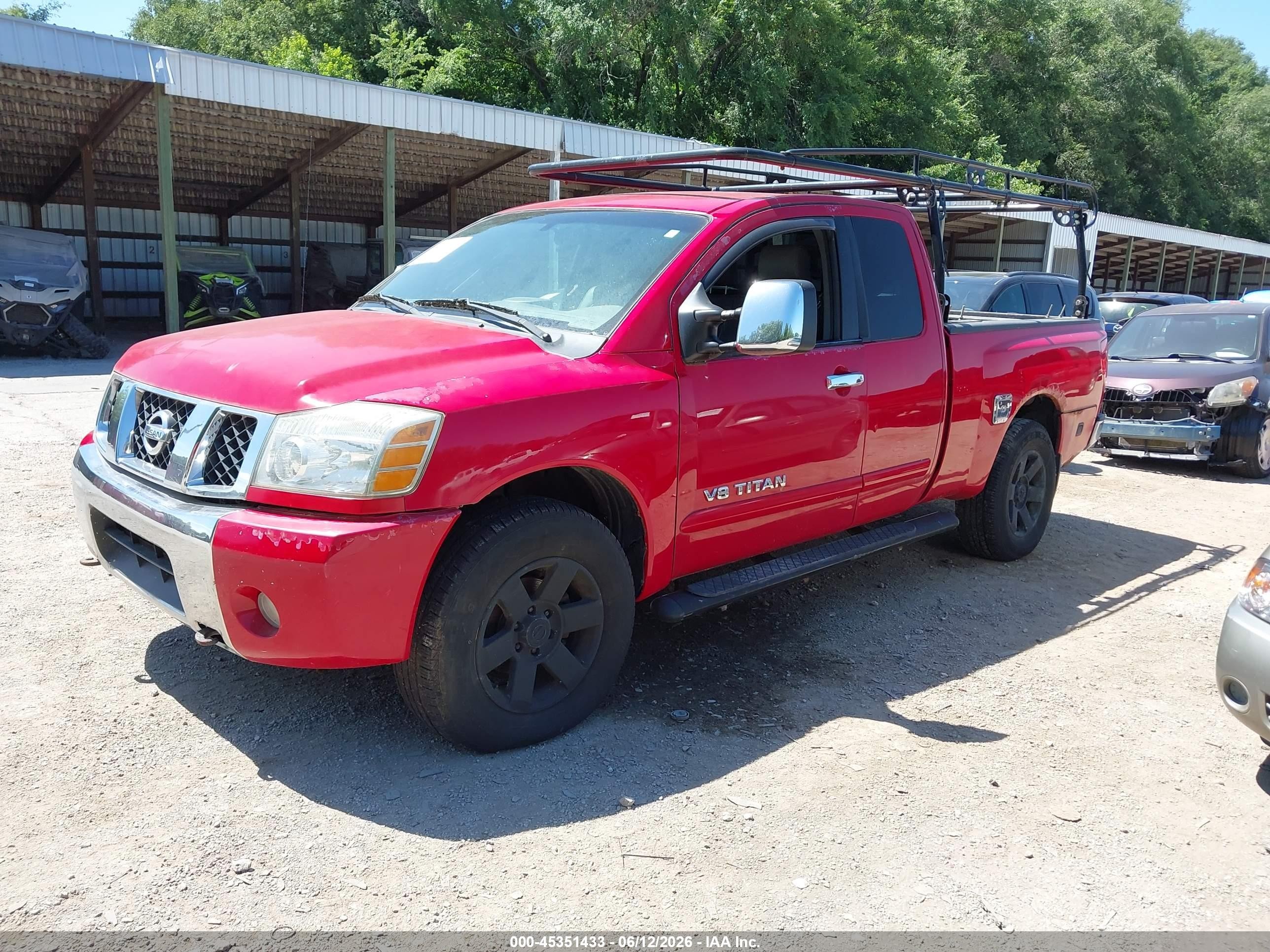 2005 Nissan Titan Le Red vin: 1N6BA06B15N550894