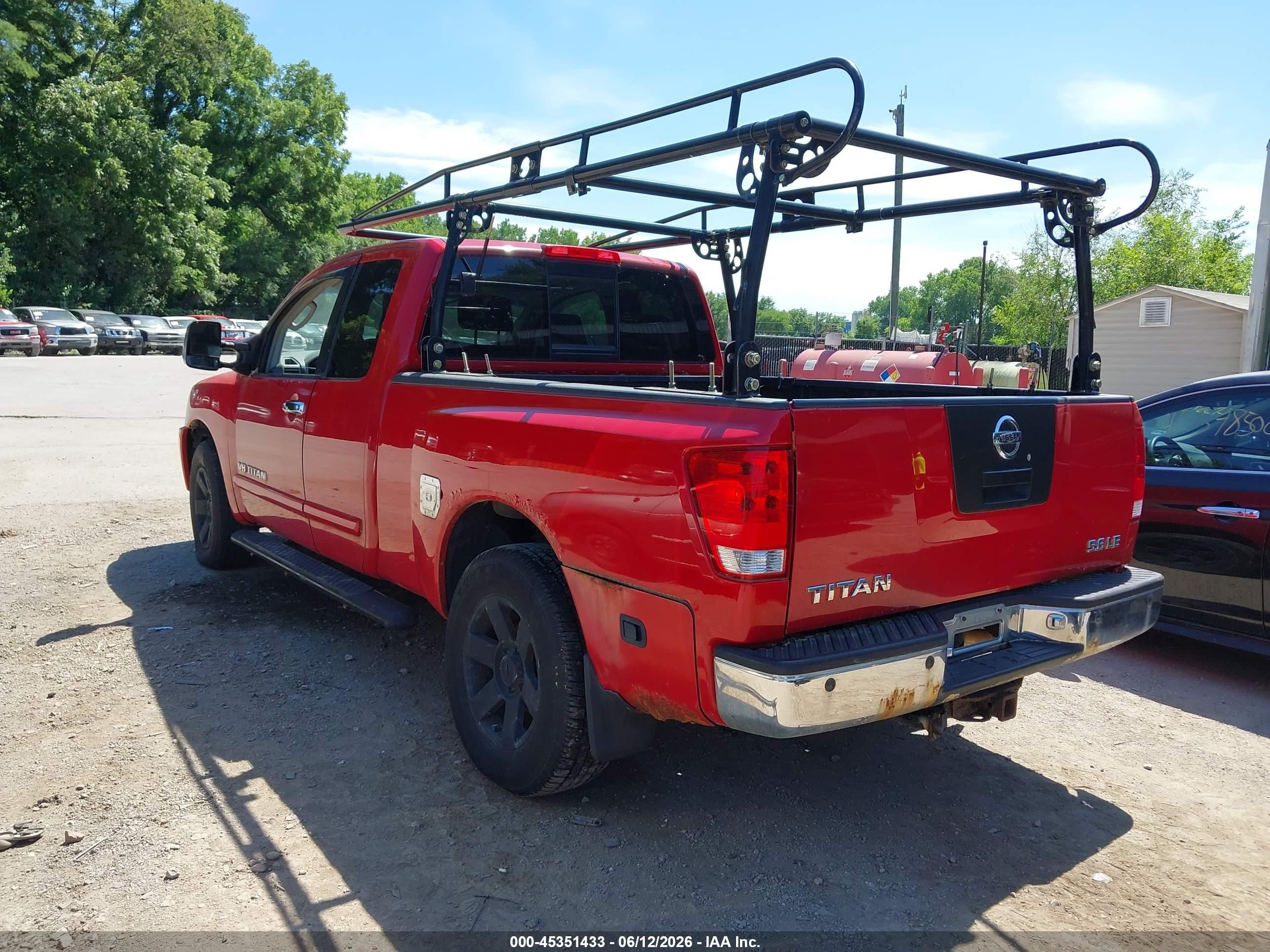 2005 Nissan Titan Le Red vin: 1N6BA06B15N550894