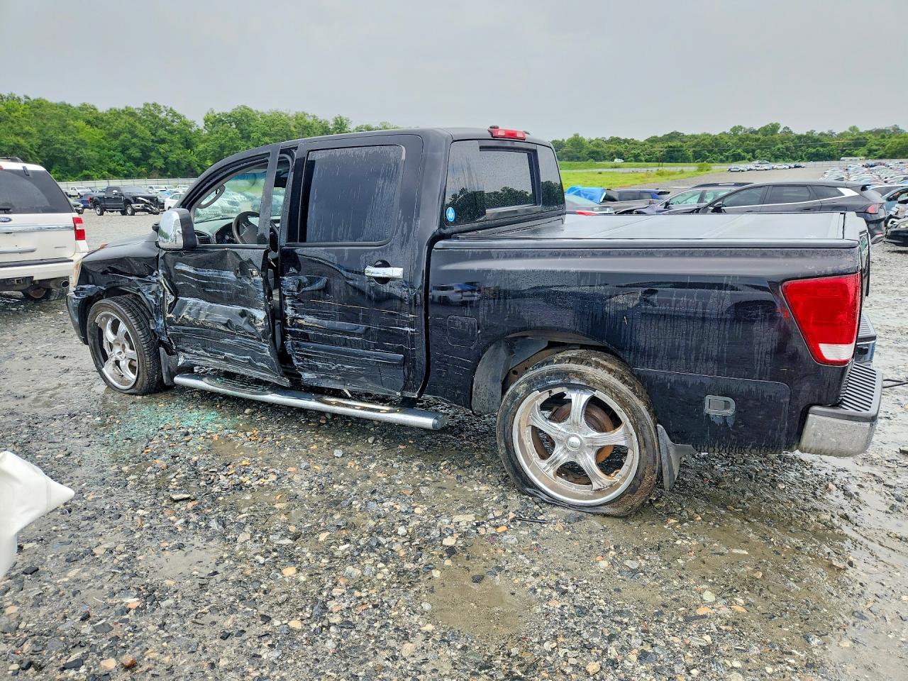 2007 Nissan Titan Xe/se/le Черный vin: 1N6BA07A17N216843