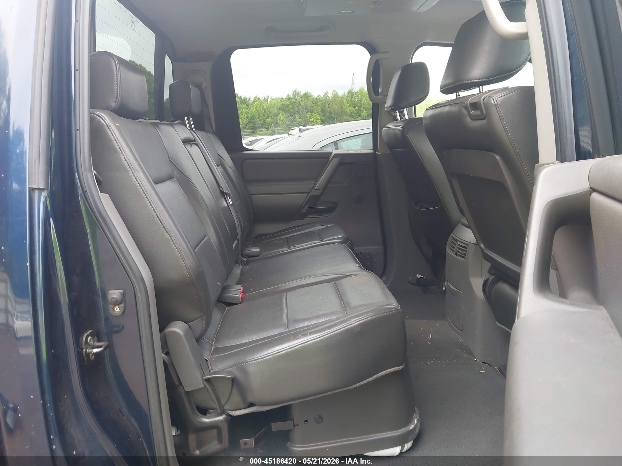 2007 Nissan Titan Le Blue vin: 1N6BA07A57N242359
