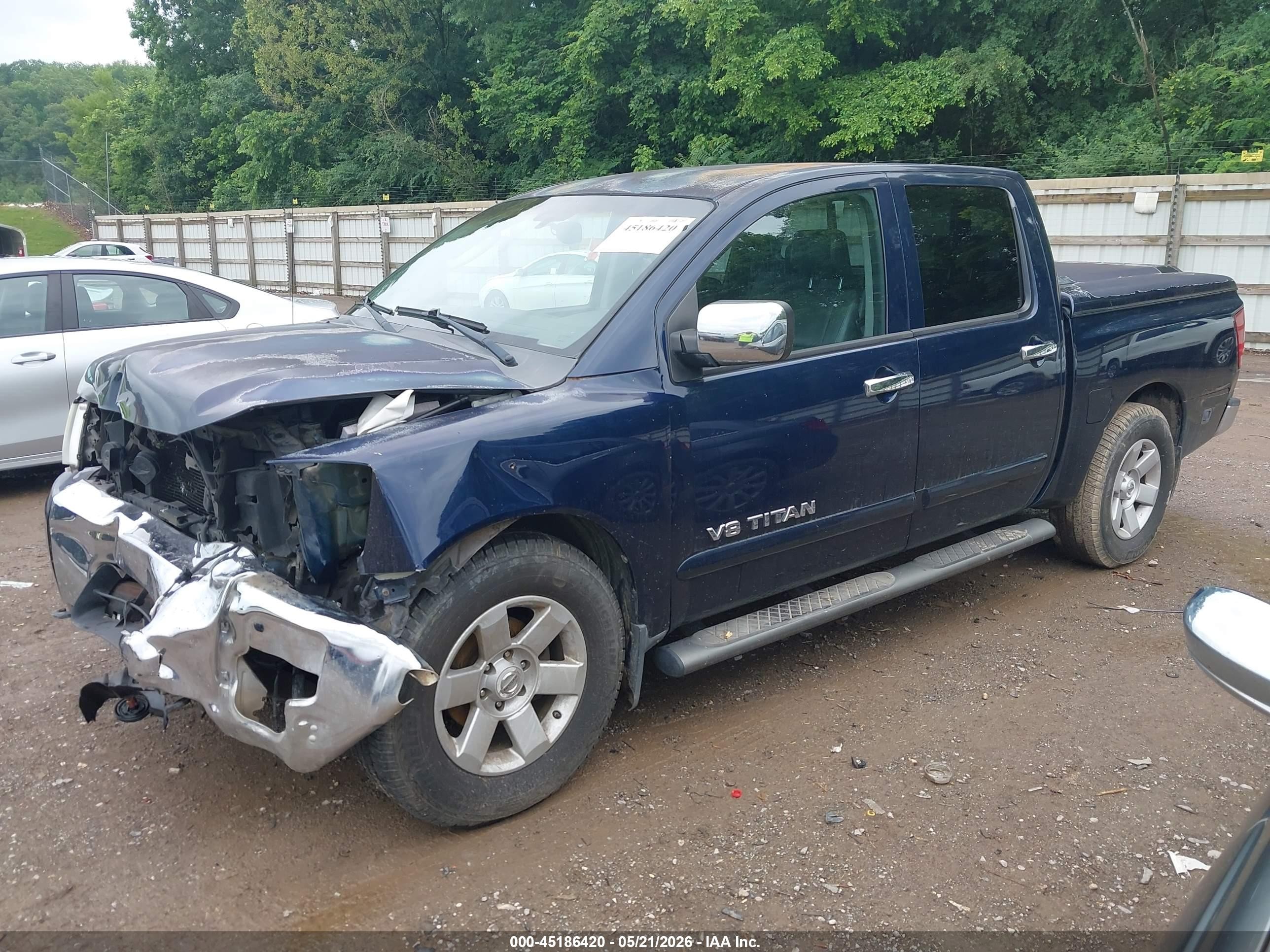 2007 Nissan Titan Le Blue vin: 1N6BA07A57N242359