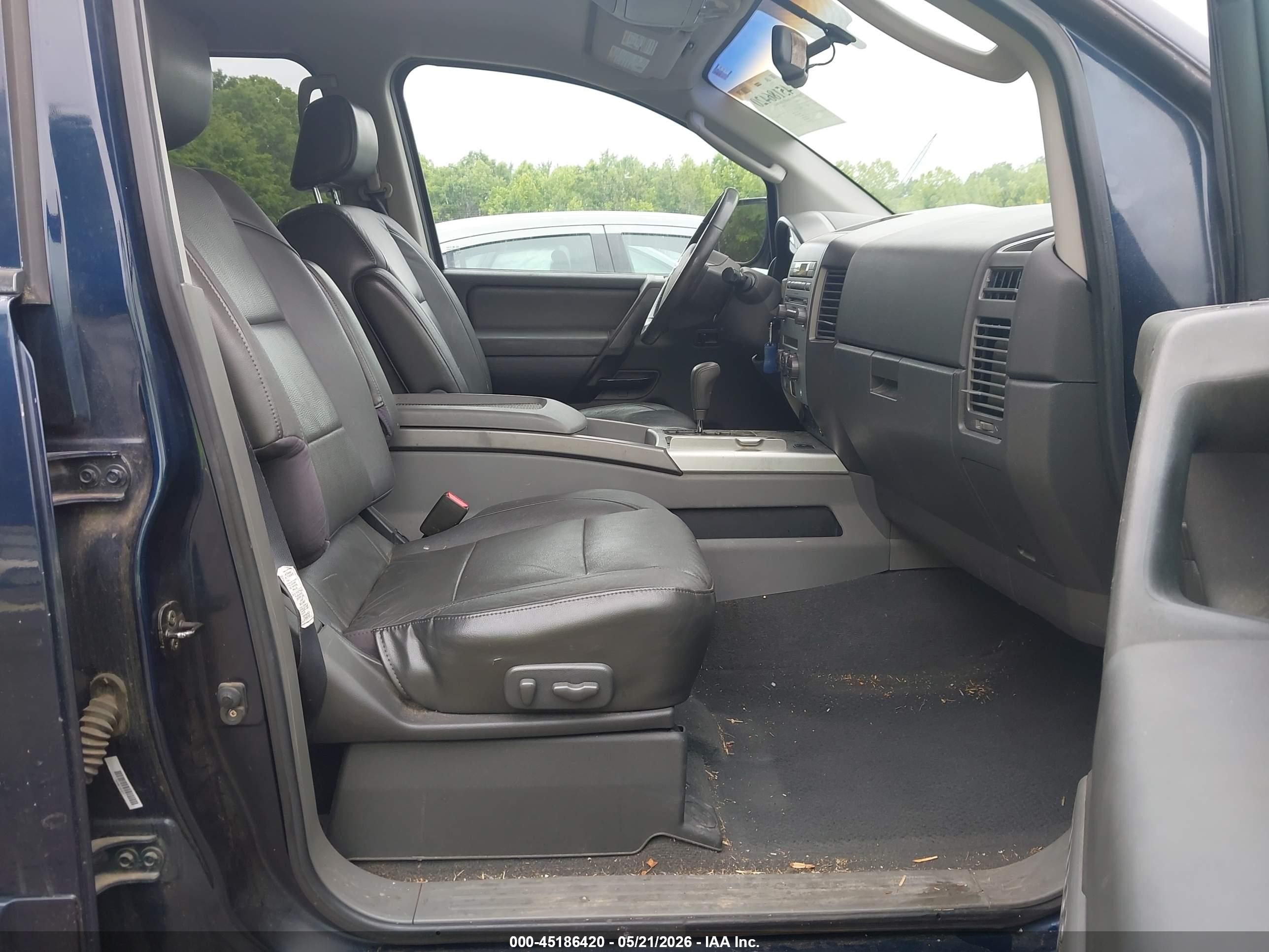 2007 Nissan Titan Le Blue vin: 1N6BA07A57N242359