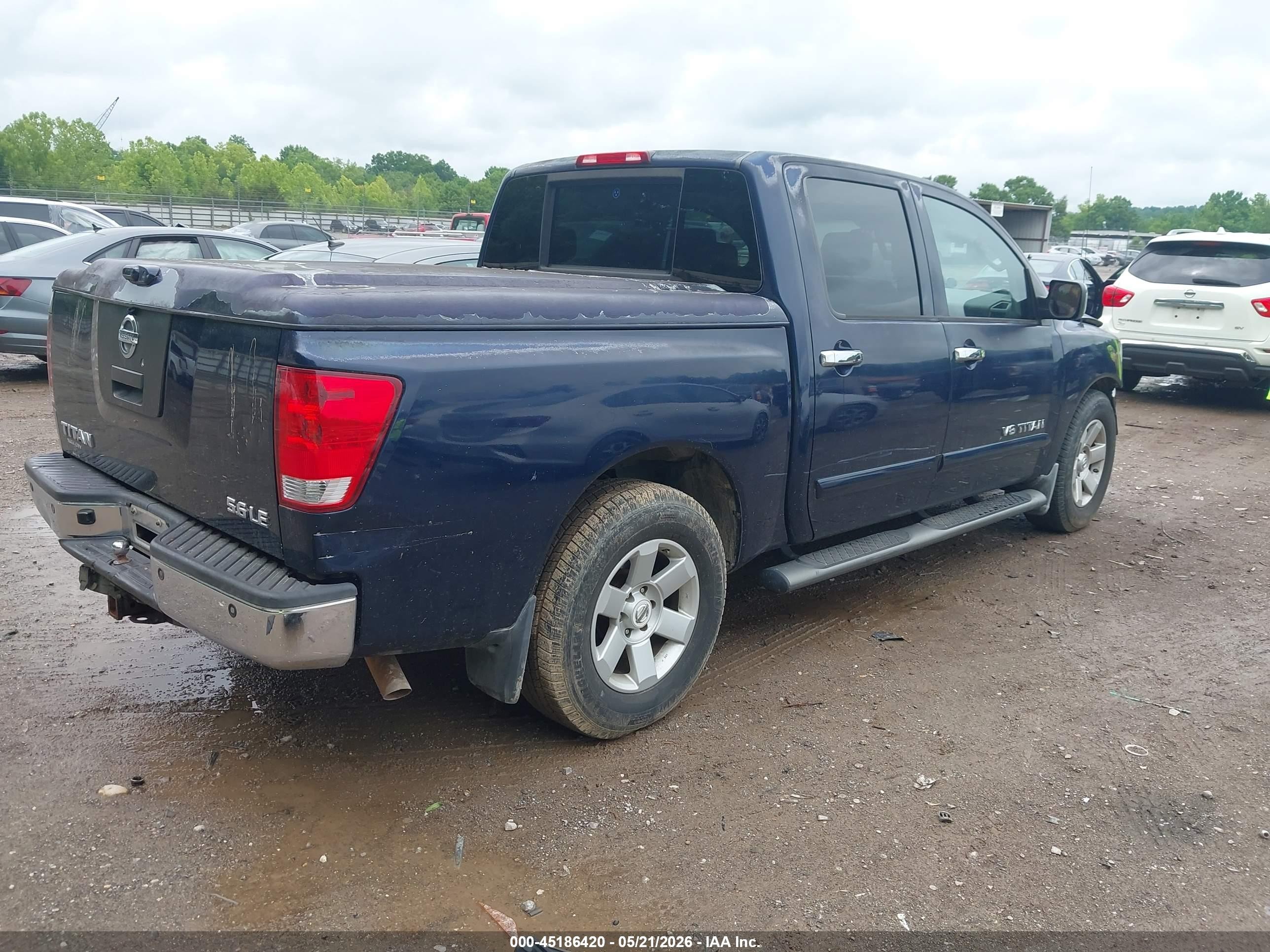 2007 Nissan Titan Le Blue vin: 1N6BA07A57N242359