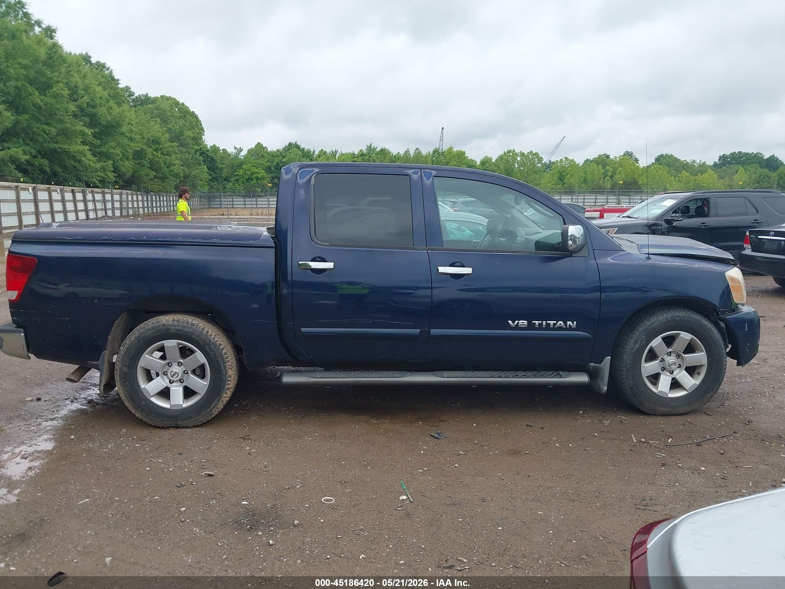2007 Nissan Titan Le Blue vin: 1N6BA07A57N242359
