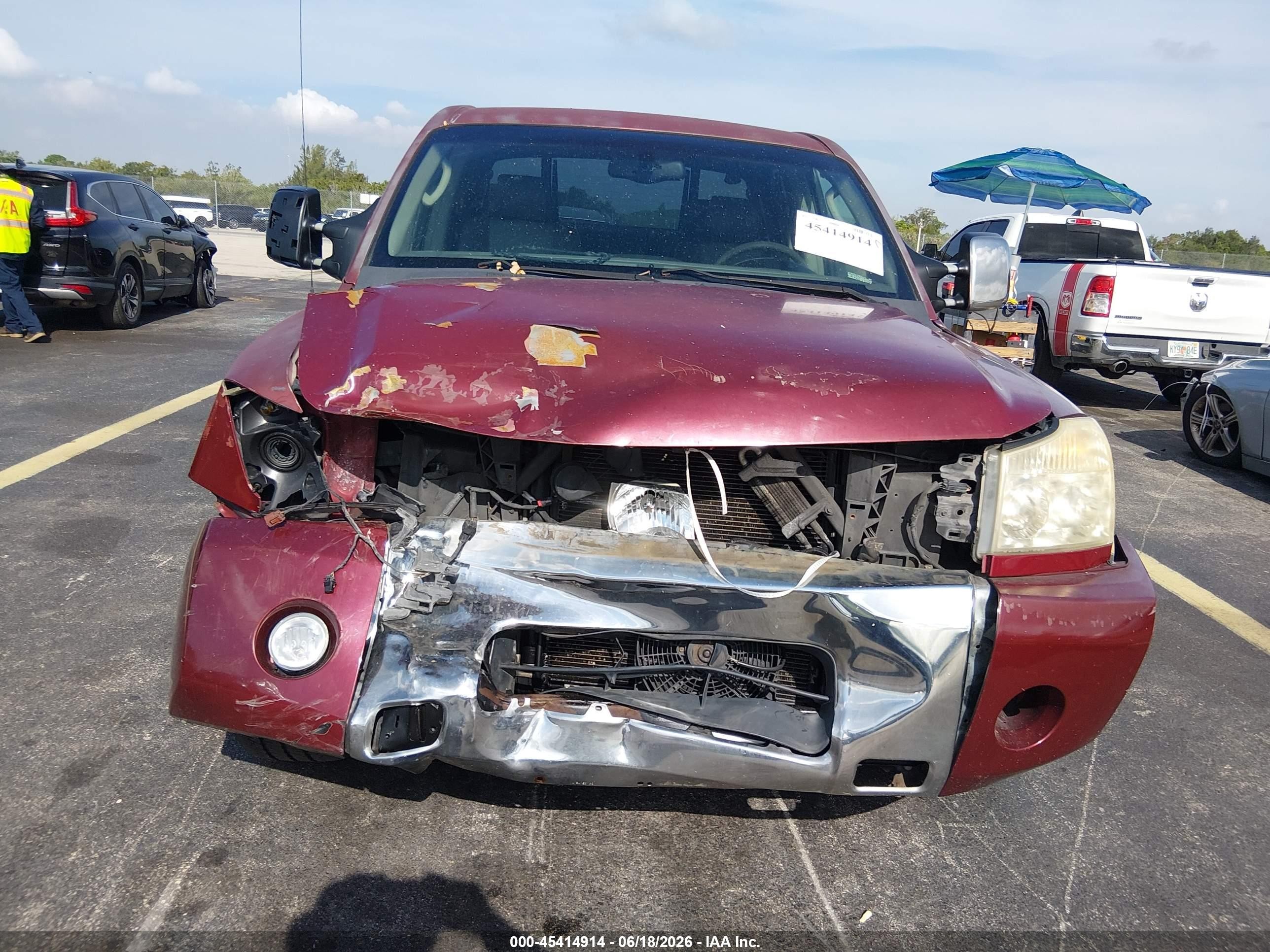 2005 Nissan Titan Le Red vin: 1N6BA07A85N544032