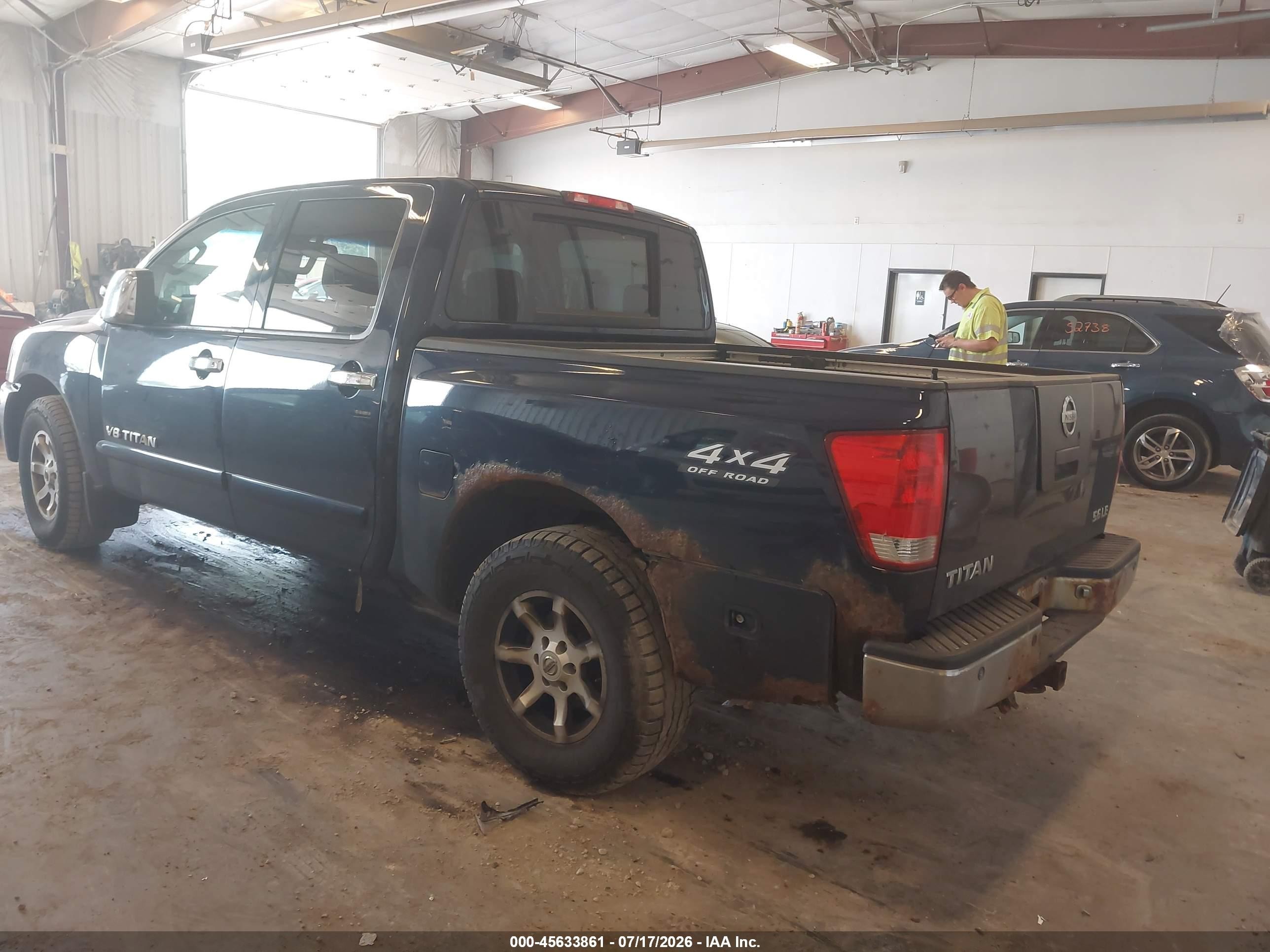 2006 Nissan Titan Le Blue vin: 1N6BA07B96N522017