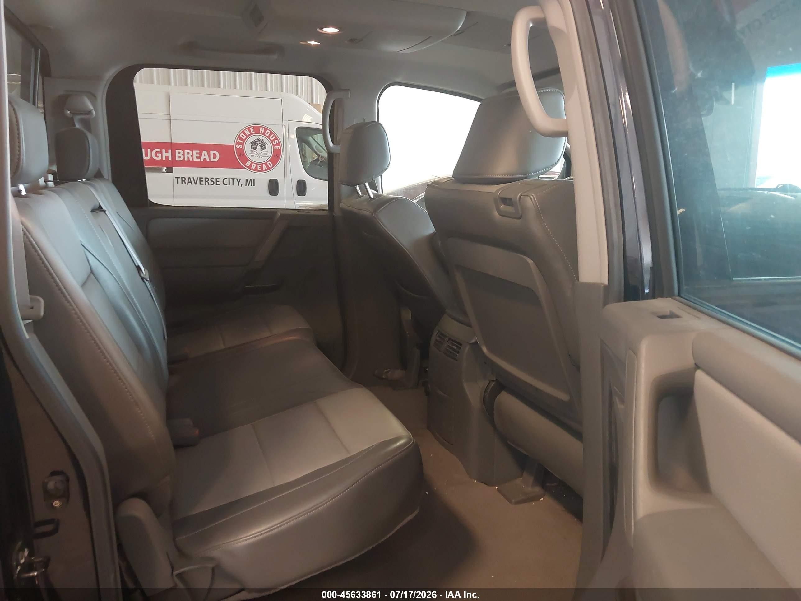 2006 Nissan Titan Le Blue vin: 1N6BA07B96N522017
